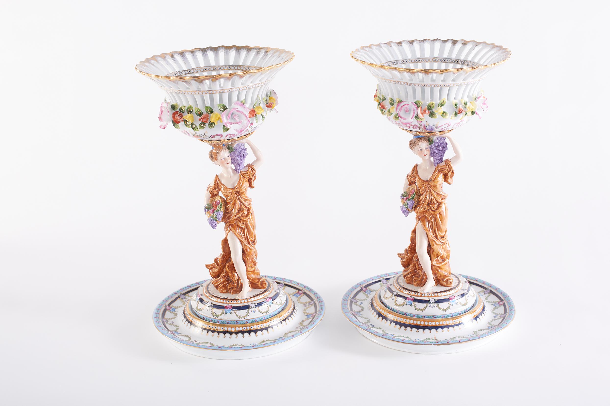 Pair gilt gold and glazed porcelain Limoges decorative tableware pieces with interior / exterior painted design details. Each piece is in great condition. Minor wear consistent with age / use. Maker's mark undersigned. Each piece stands about 18