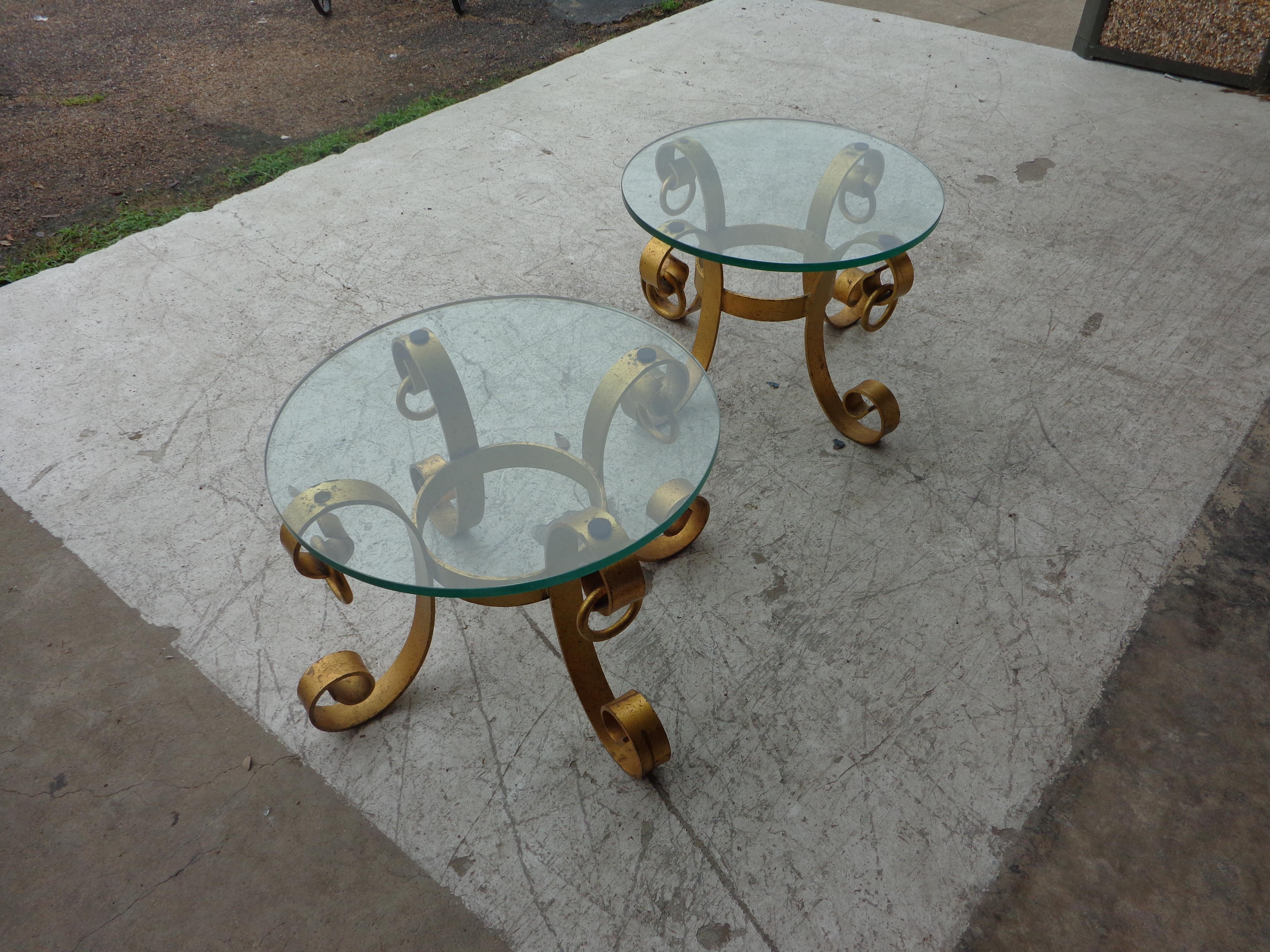 1940s Italian wrought iron gilt side tables

Solid wrought iron with gilt finish and glass top side tables.
21.75