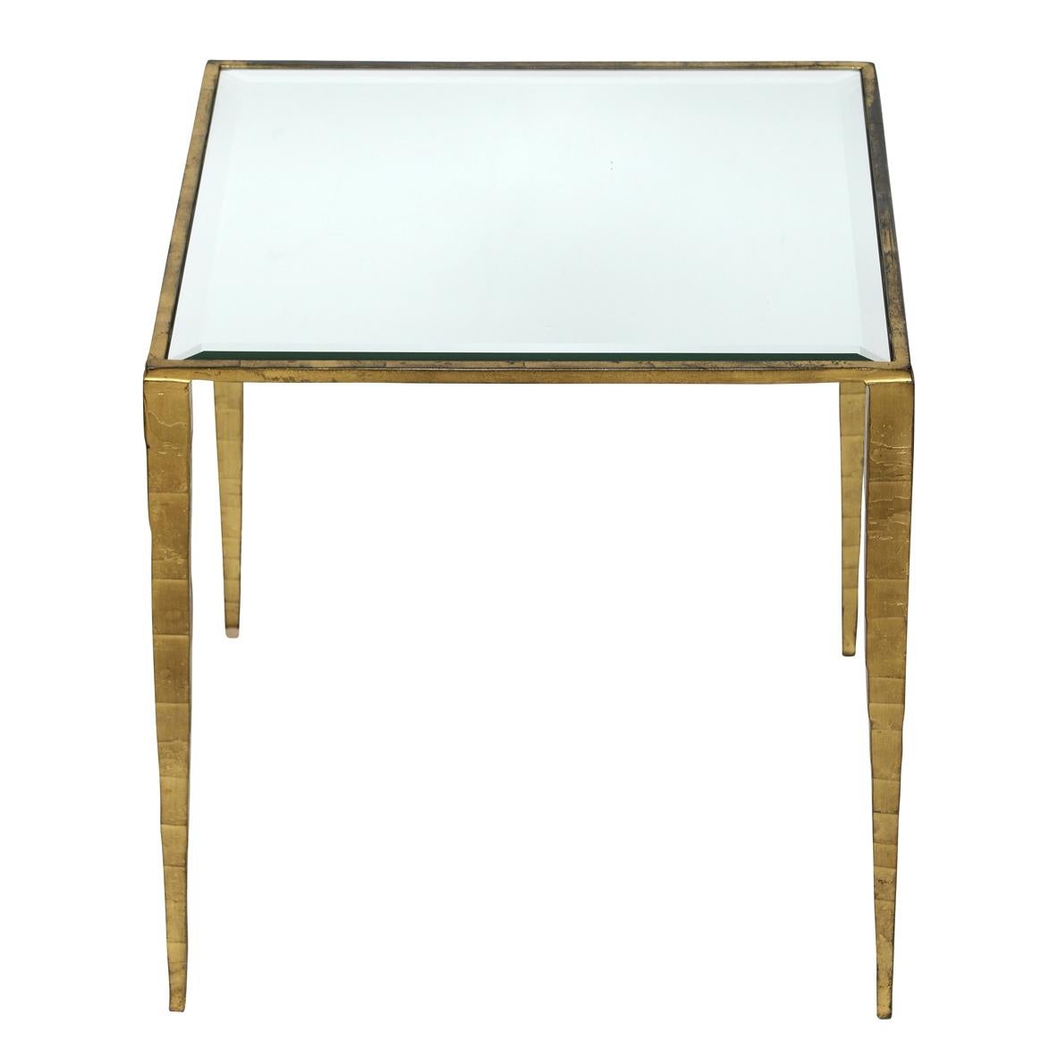 Pair of gilt metal side tables with slender tapered legs and mirrored tops.