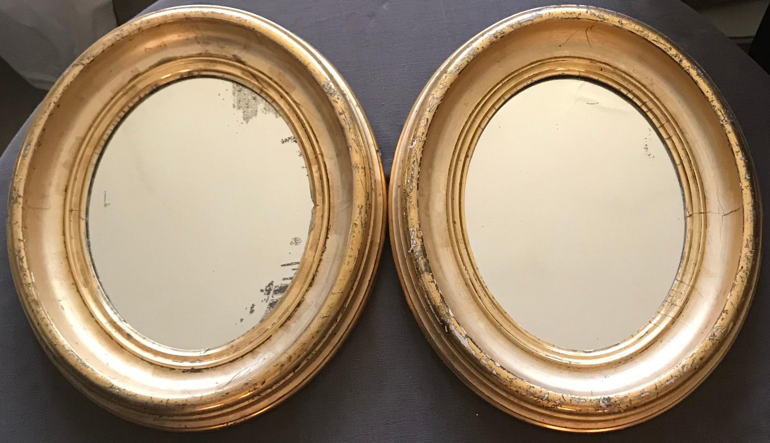 Pair of gilt oval mirrors. Richly coloured lemon gilt oval frames with original mirror plates from the American South. United States, circa 1840.
Dimensions: 14.5