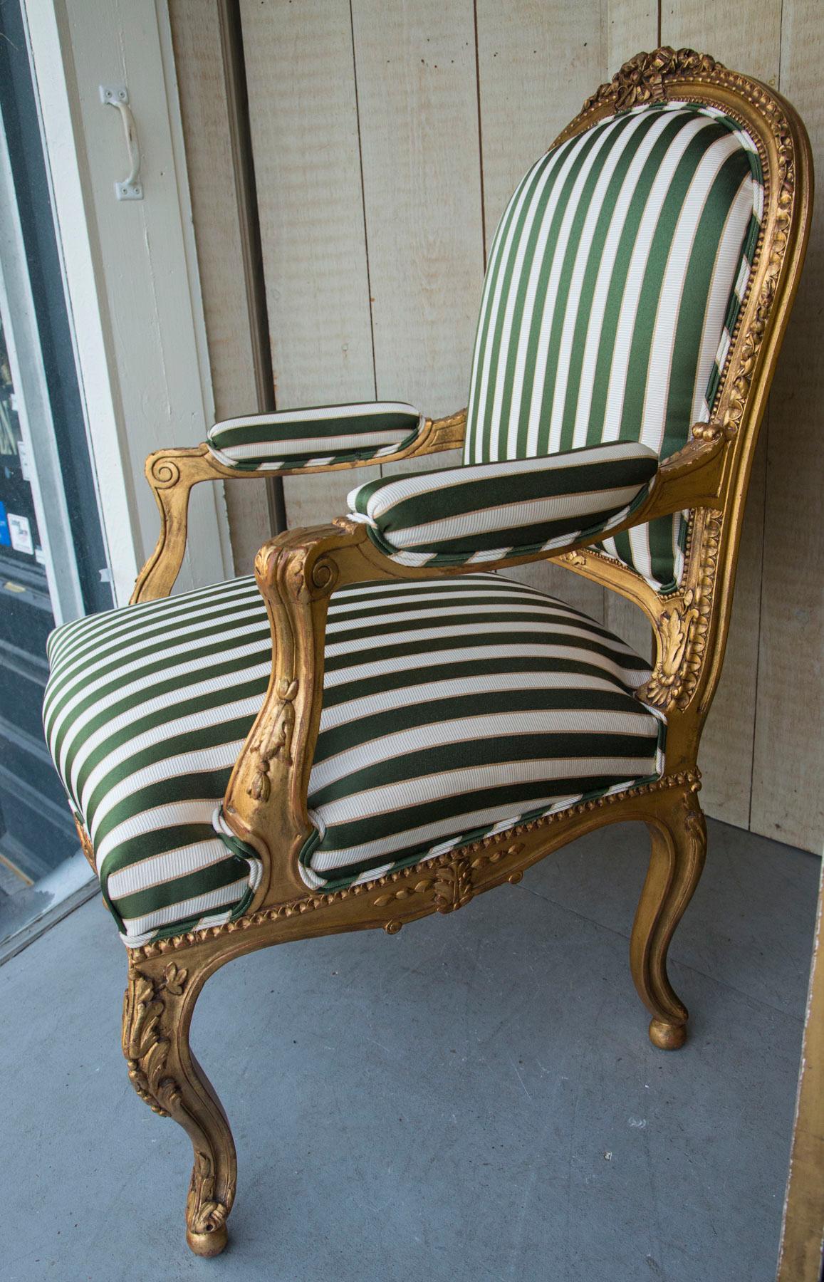 Hand-Carved Pair of Giltwood Louis XV Style Fauteuils For Sale