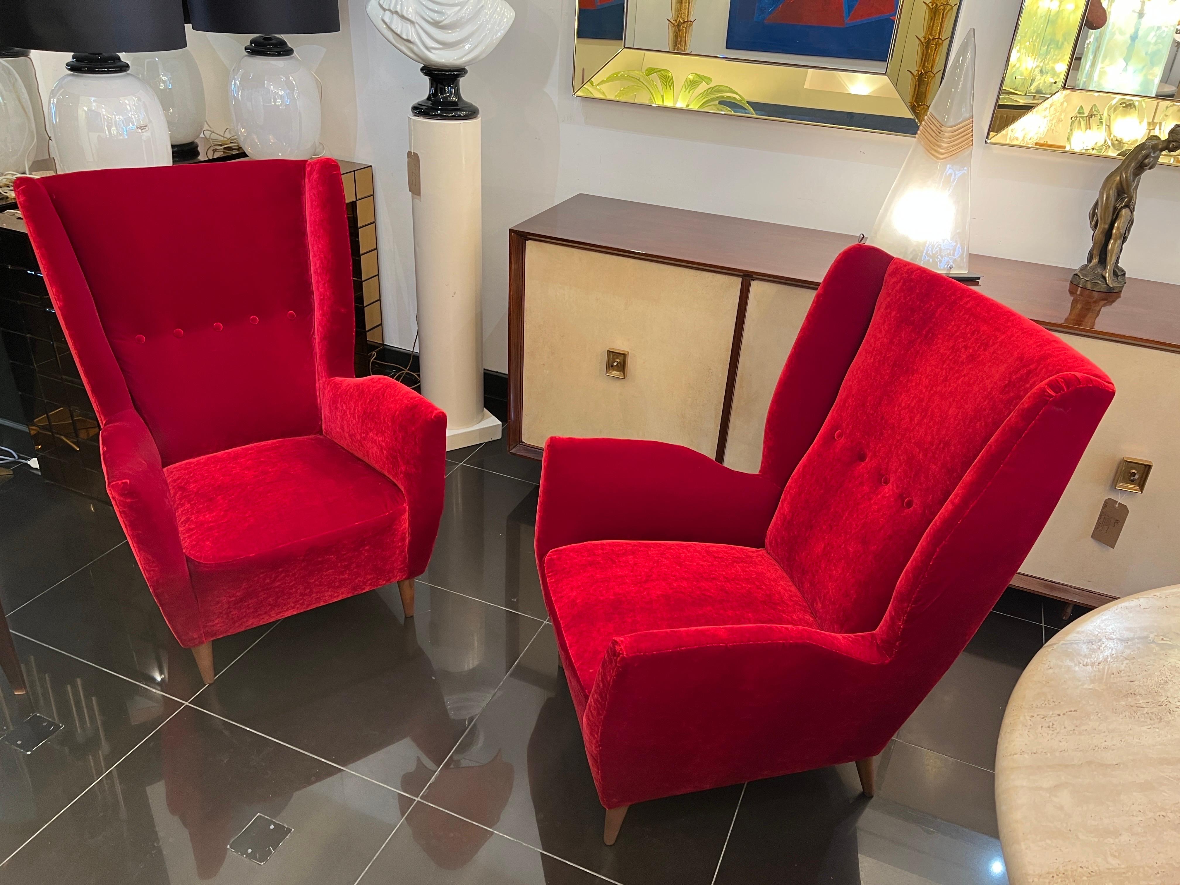 Hand-Crafted Pair Gio Ponti wingback armchairs in Venetian red velvet  For Sale