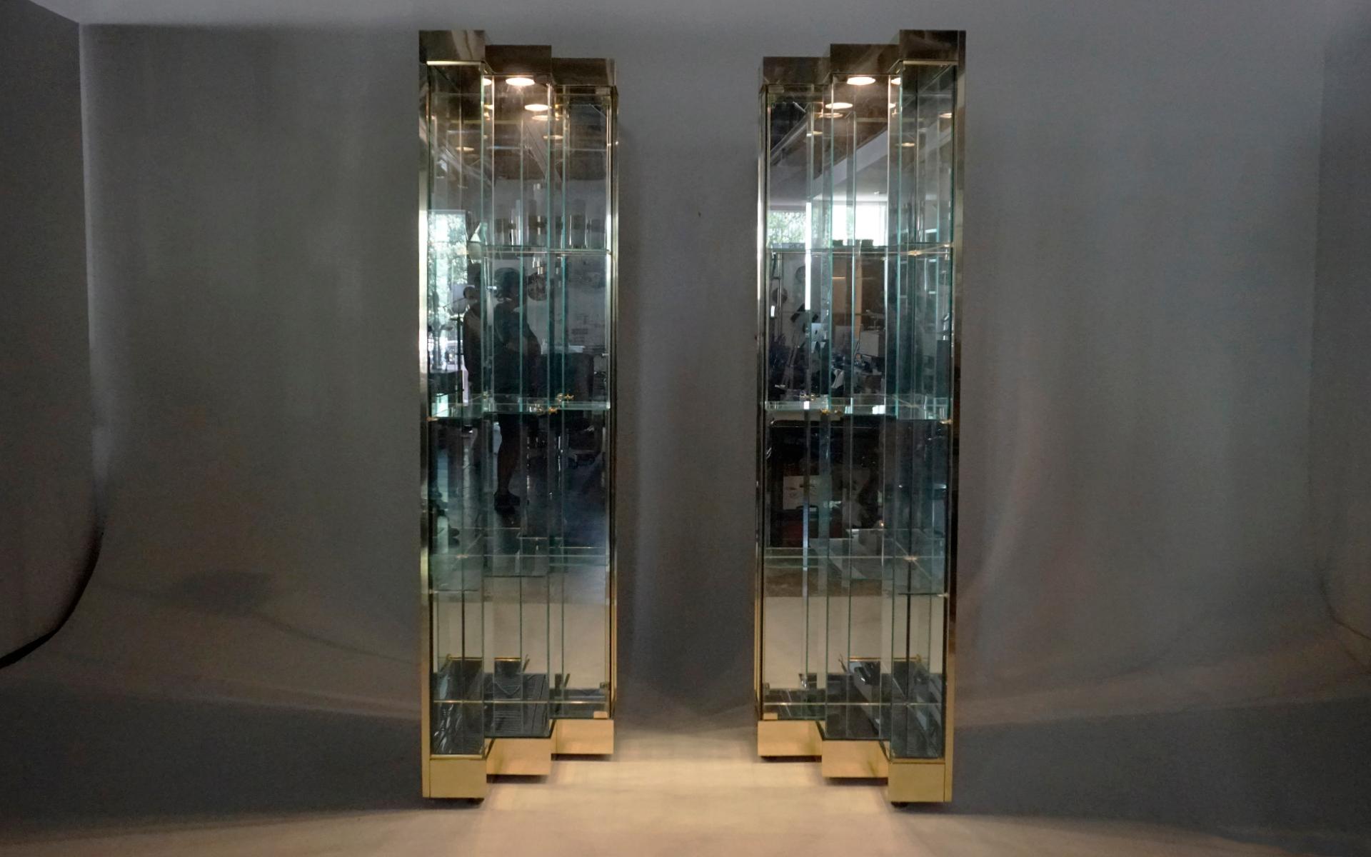 Pair Glass and Brass Display Cabinets. Corner or Freestanding w/ Stairstep doors 2
