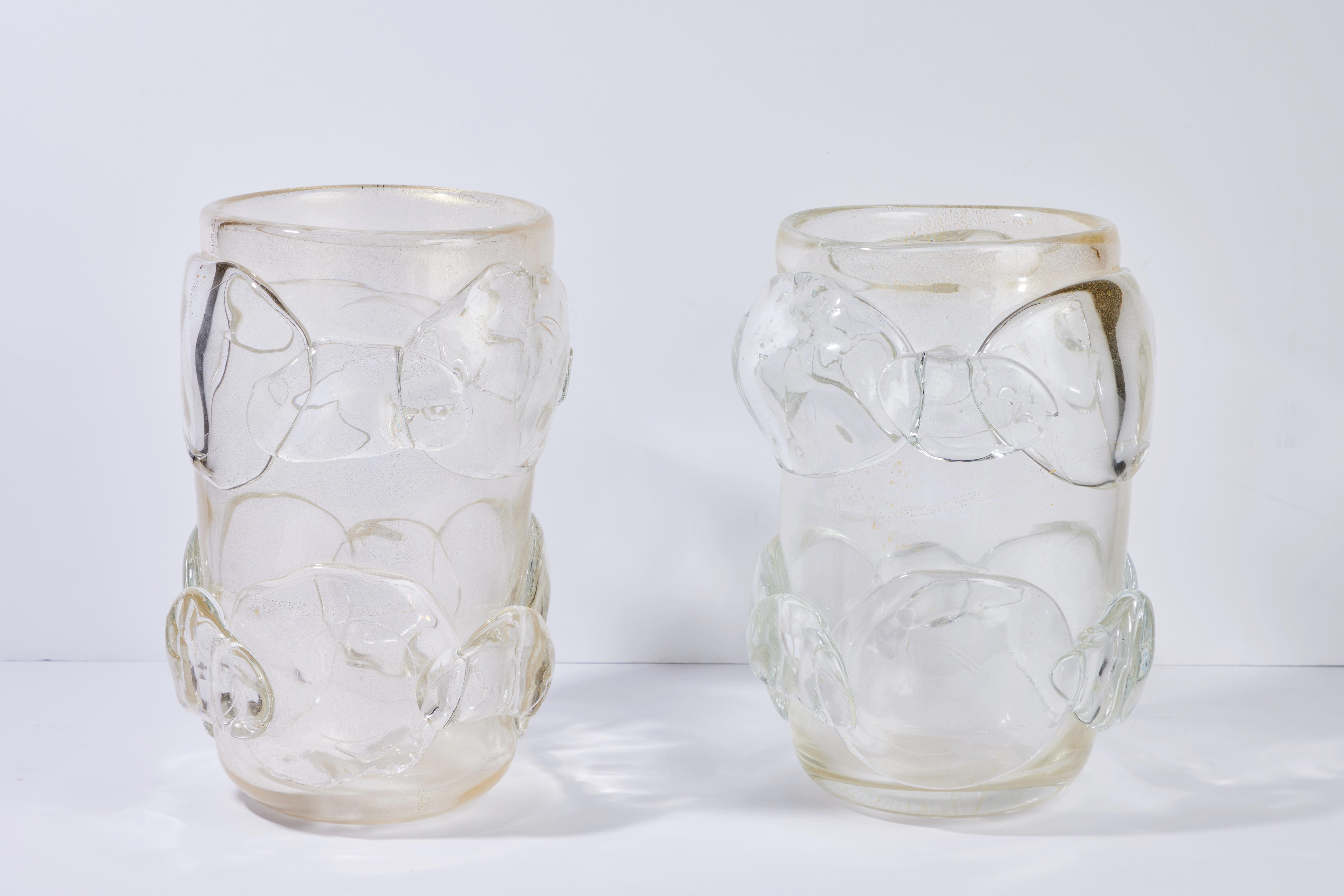 A pair of striking hand-blown glass flecked with 22 karat gold Murano vases.