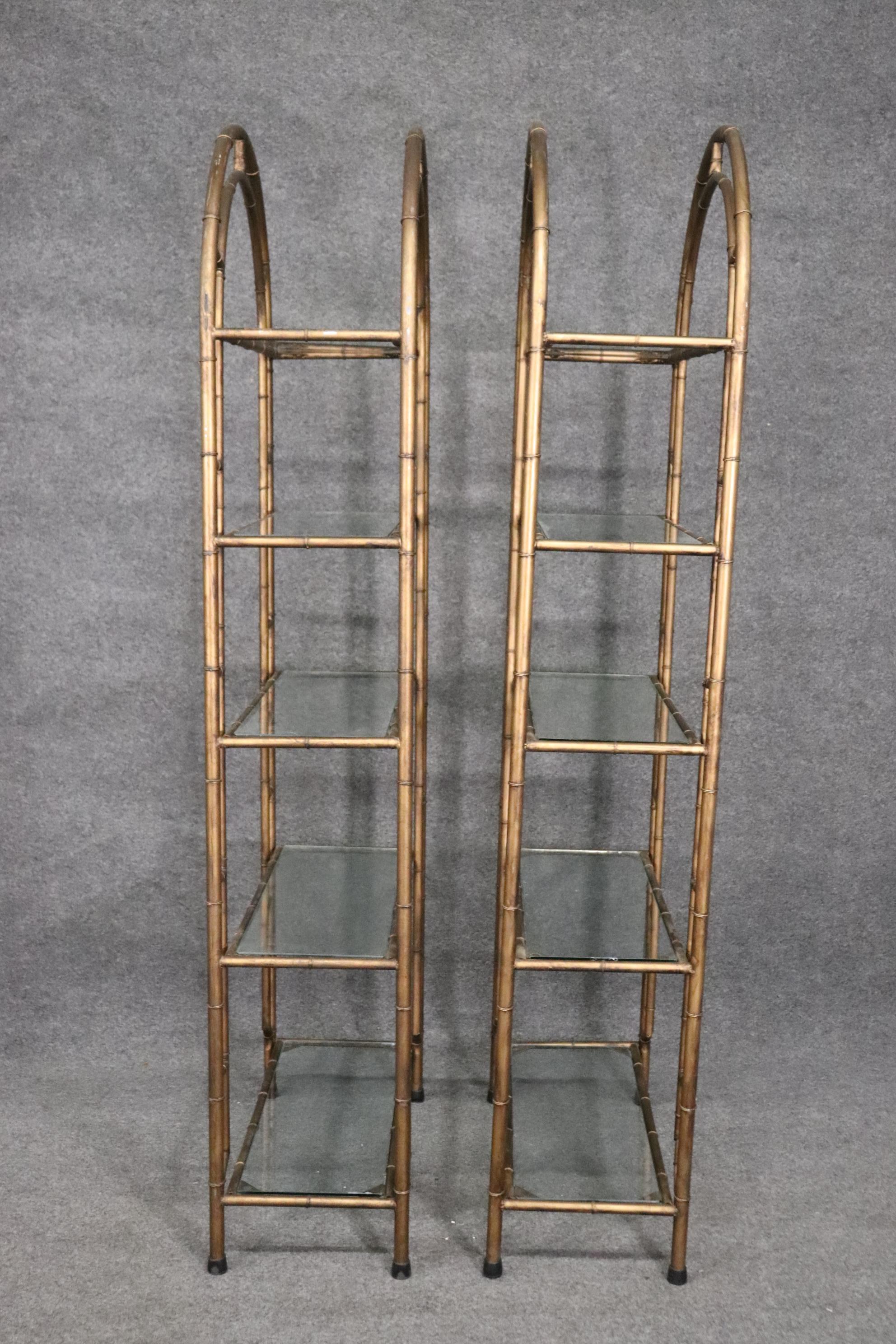 Hollywood Regency Pair Gold Gilded Arched Faux Bamboo Steel Etageres Bookshelves, Circa 1950s