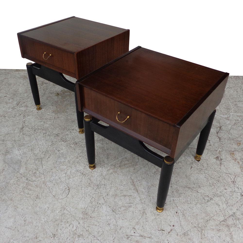 Pair of Tola Librezza mahogany nightstands by Donald Gomme
 
Designed by Gomme in 1958 as part of his Tola and Black Librenza series.
Single-drawer mahogany end/bedside tables with a single drawer over an ebonized base.
Stamped with maker's