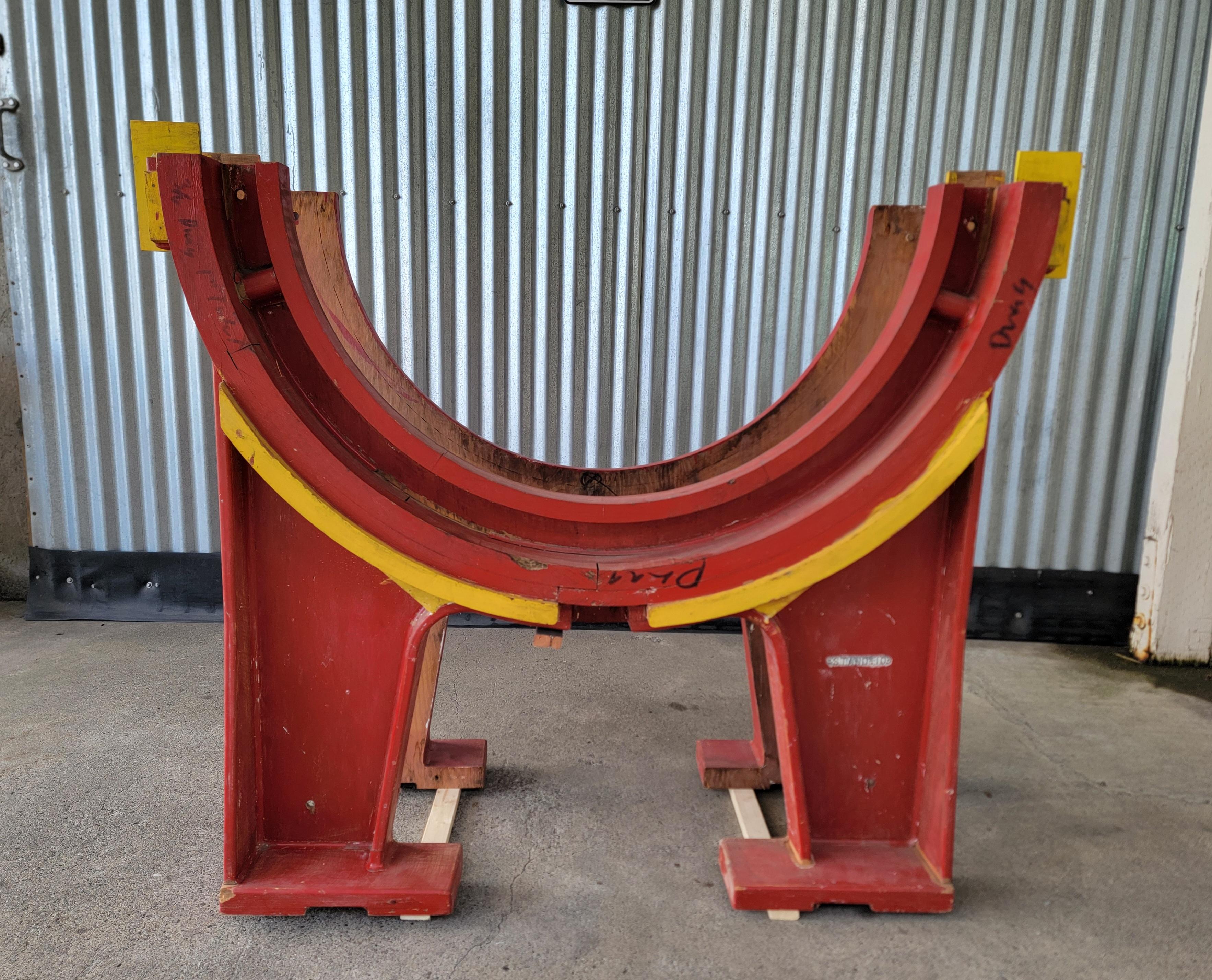 A matched pair of wooden foundry molds. Large-scale measuring approximately 48 inches wide and 40 inches high. Would make an impressive wall decoration or could be repurposed as a table base. Original painted surface. Metal tag 
