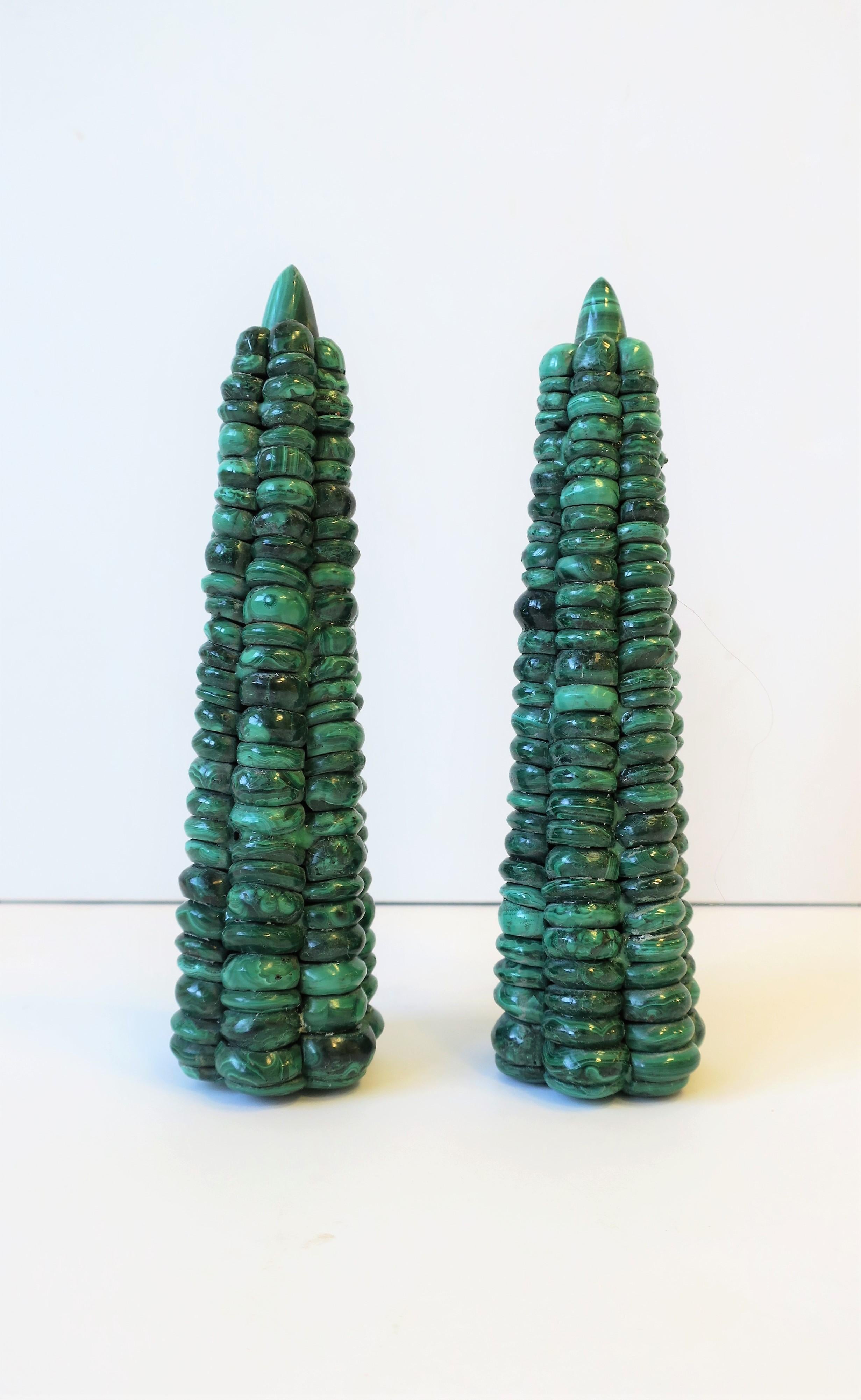 A very beautiful and rare pair of green Malachite 'Corn-on-the-Cob' Obelisks, circa 20th century. Sold as a set. Each measure: 6.75