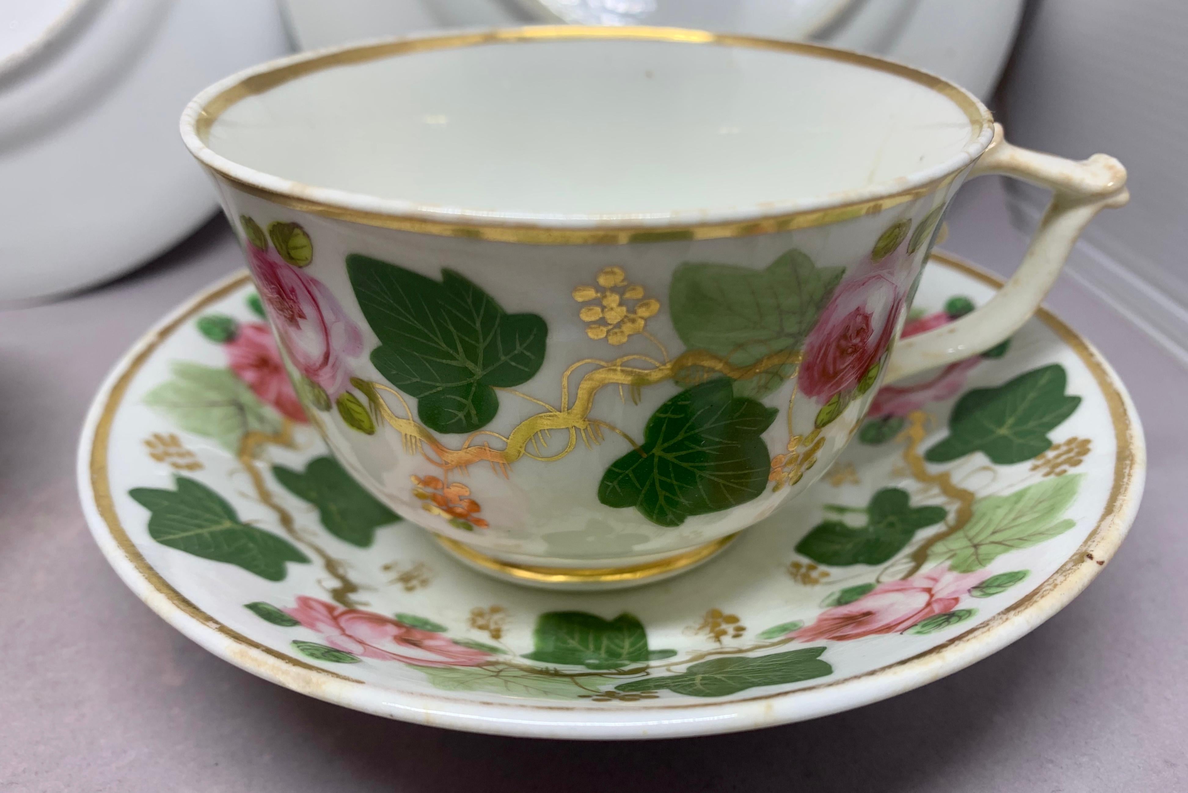 English Pair Green Pink and Gilt Grape Leaf and Rose Cups and Saucers For Sale