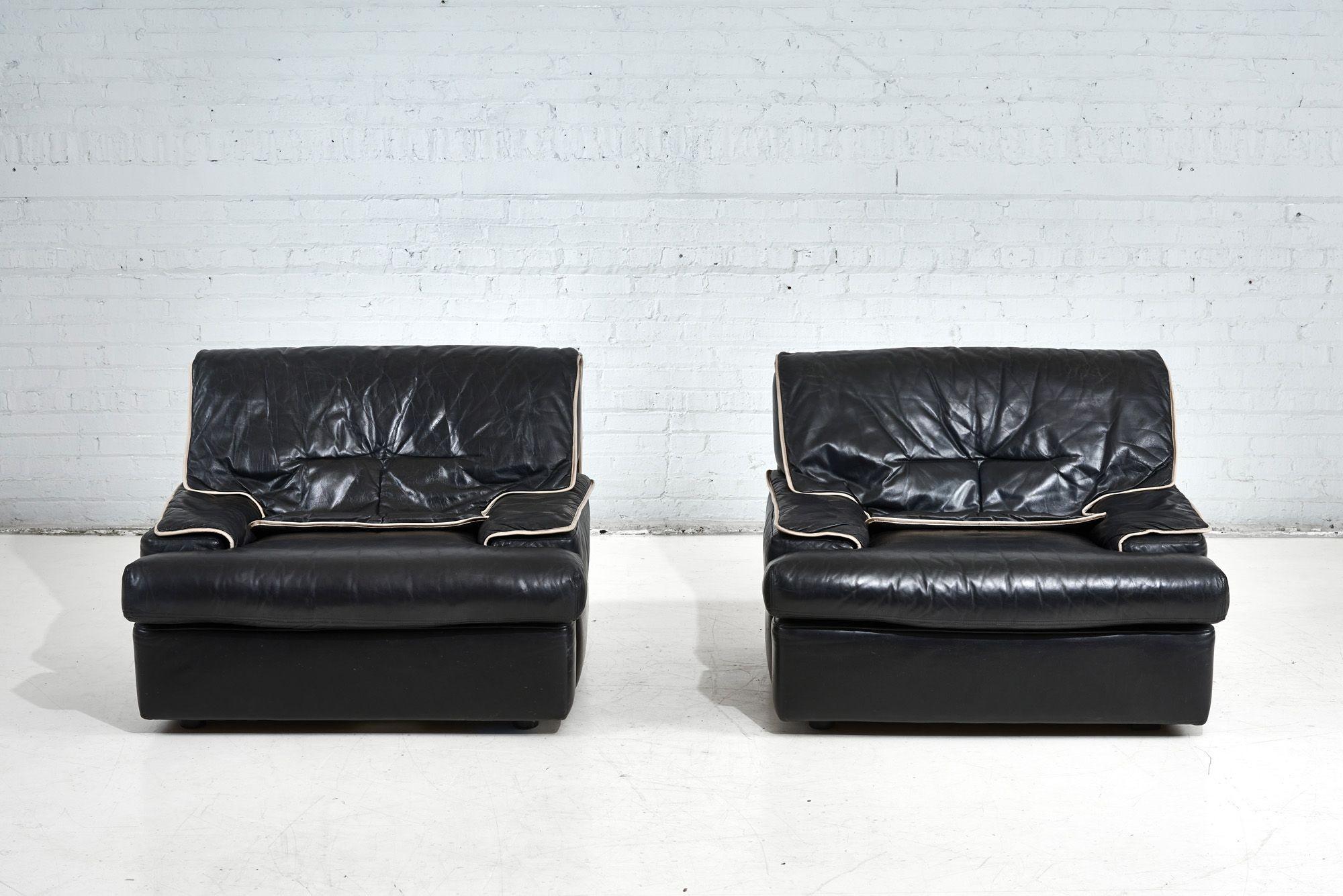 Pair Guido Faleschini black leather lounge chairs, Italy 1970. Original leather in excellent condition.