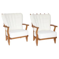 Pair Guillerme et Chambron Oak Petite Repos French Lounge Chairs Votre Maison