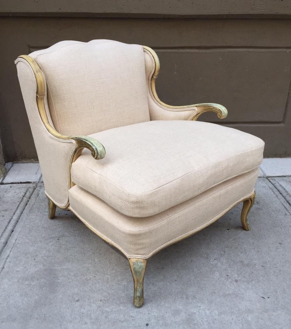 Pair of Gustavian style linen lounge chairs. It has a painted wood frame.