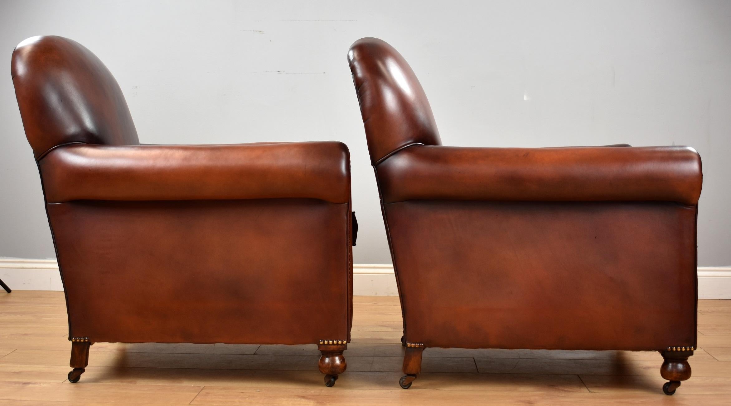 Early 20th Century Pair of Han Dyed Honey Brown Leather Armchairs