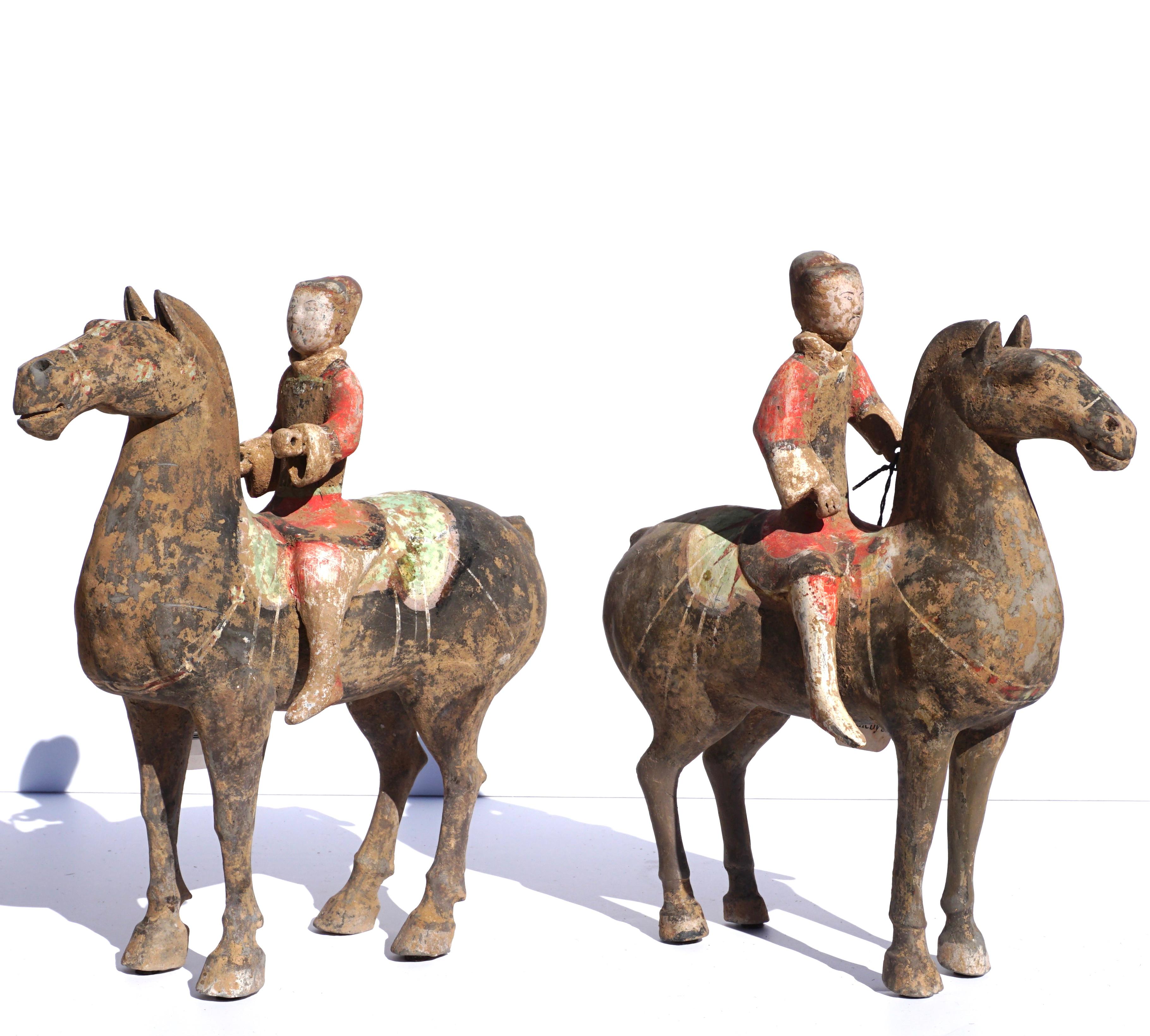 A wonderful pair of Ex Sotheby’s painted Polychrome Equestrian Horse and Riders made from gray pottery, Presents beautifully and guaranteed authentic with provenance and COA. 

Measures: Height 11.5 inches and width 11 inches

Condition: Possible
