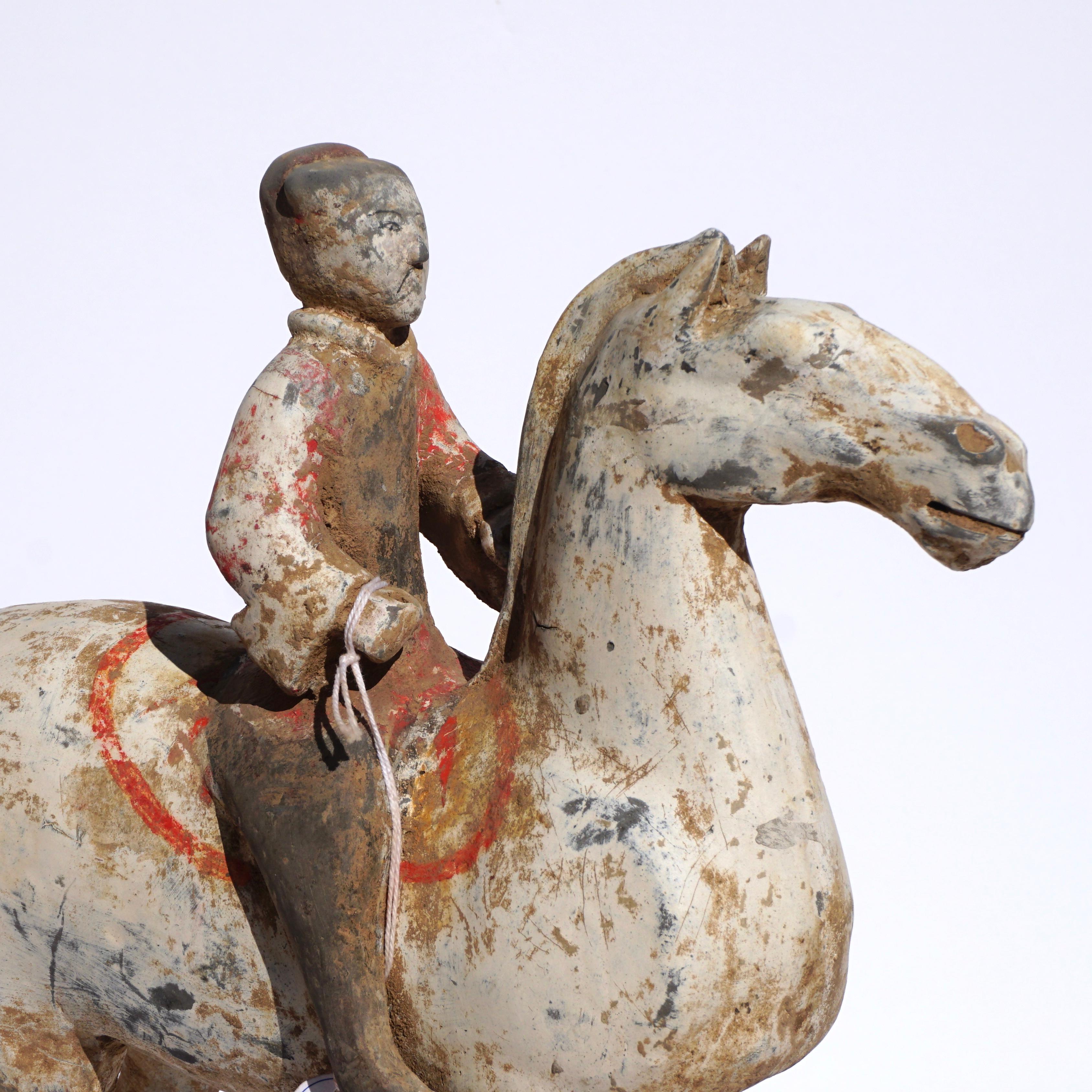 Polychromed Pair of Han Dynasty pottery Horses and Equestrian Riders For Sale