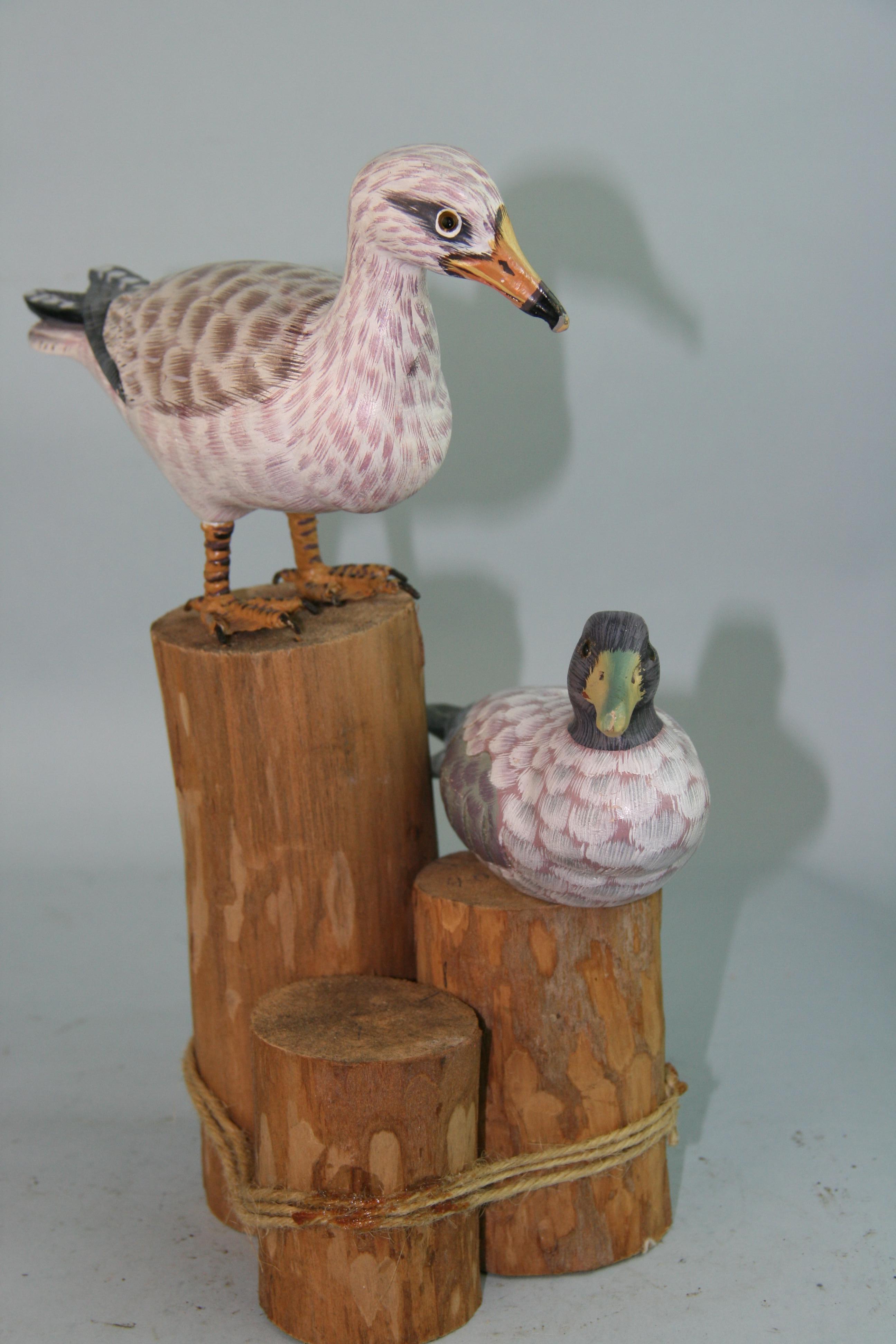 Late 20th Century Pair Hand Carved and Painted Sea Birds on Wood Post For Sale