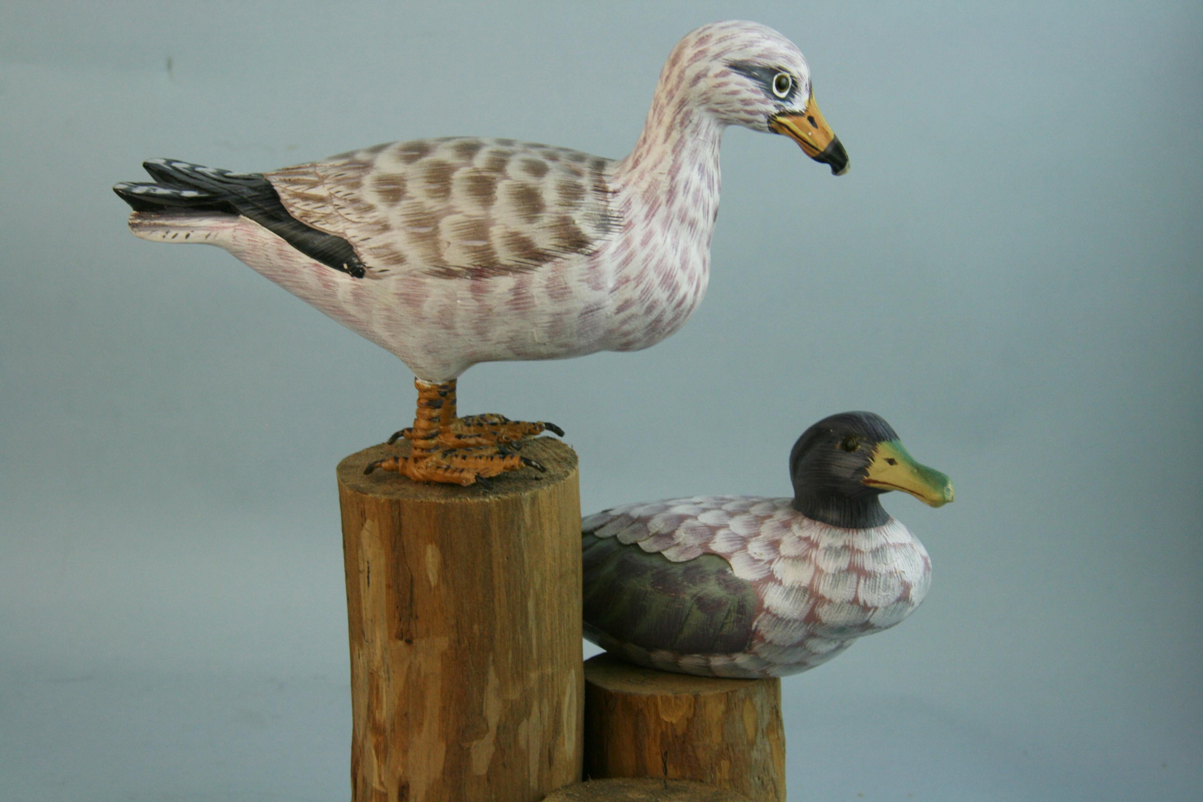 Hardwood Pair Hand Carved and Painted Sea Birds on Wood Post For Sale