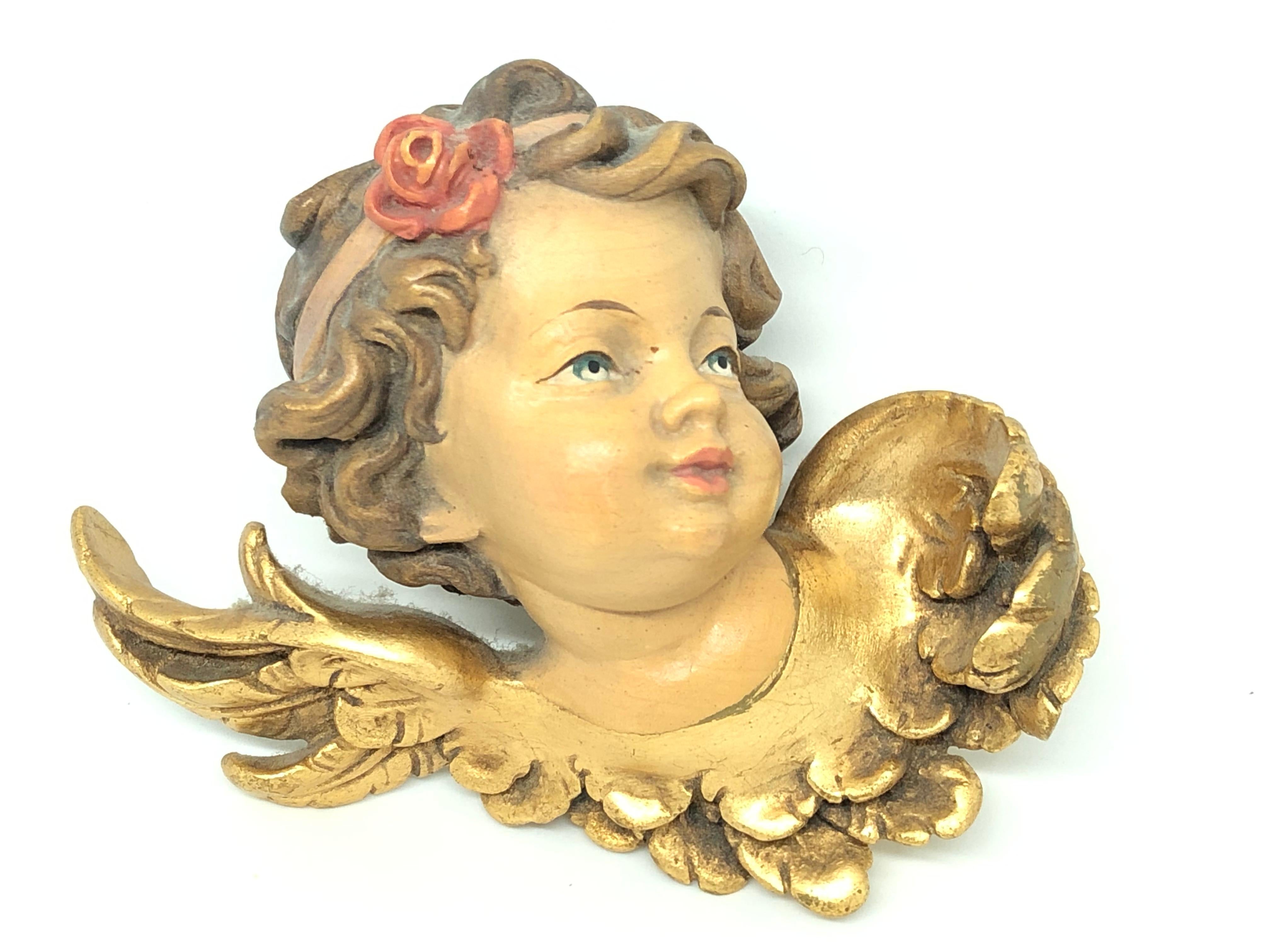 Beautiful hand carved pair of Cherub Angel head, found at an estate sale in Germany. Made by Anri a well-known wood carving company in Italy. We believe that these pieces are from the 1960s. A nice addition to any room. Measurements given for the