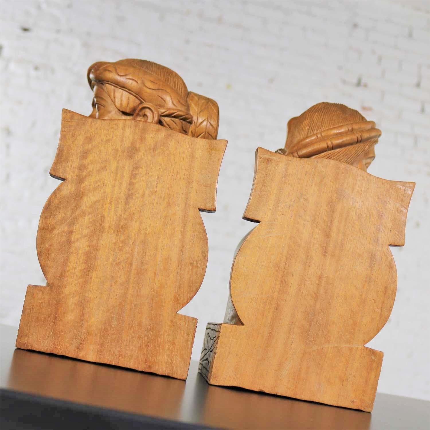 Pair of Hand Carved Wood Tribal Figural Male and Female Bookends In Good Condition For Sale In Topeka, KS