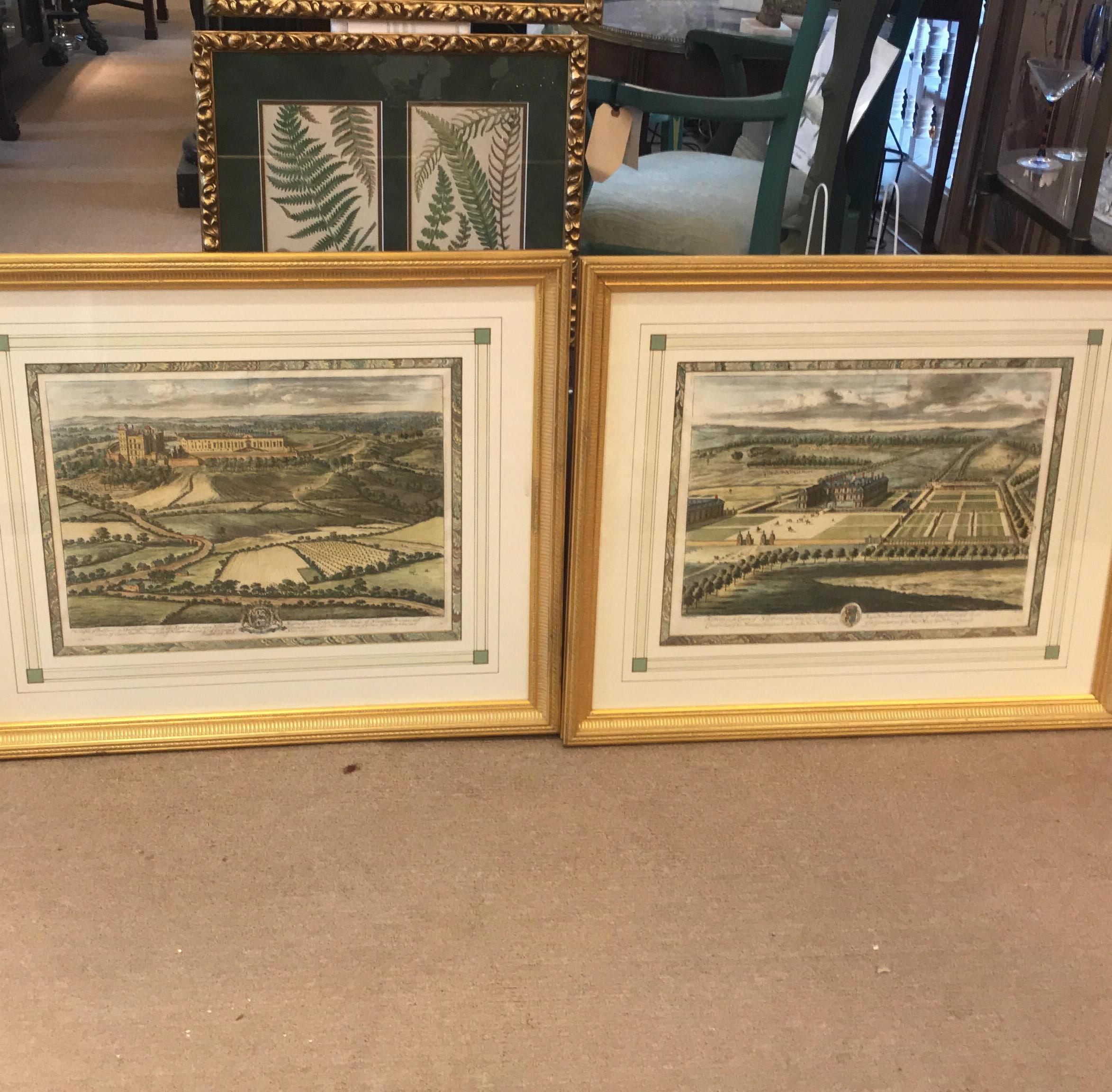 A pair of early 18th century hand colored copper engravings from the Britannia Illustrata of spectacular views of the Queens Palaces, printed during the Queen Anne Period. 1707-09 Each one with giltwood frames with hand decorated French matting