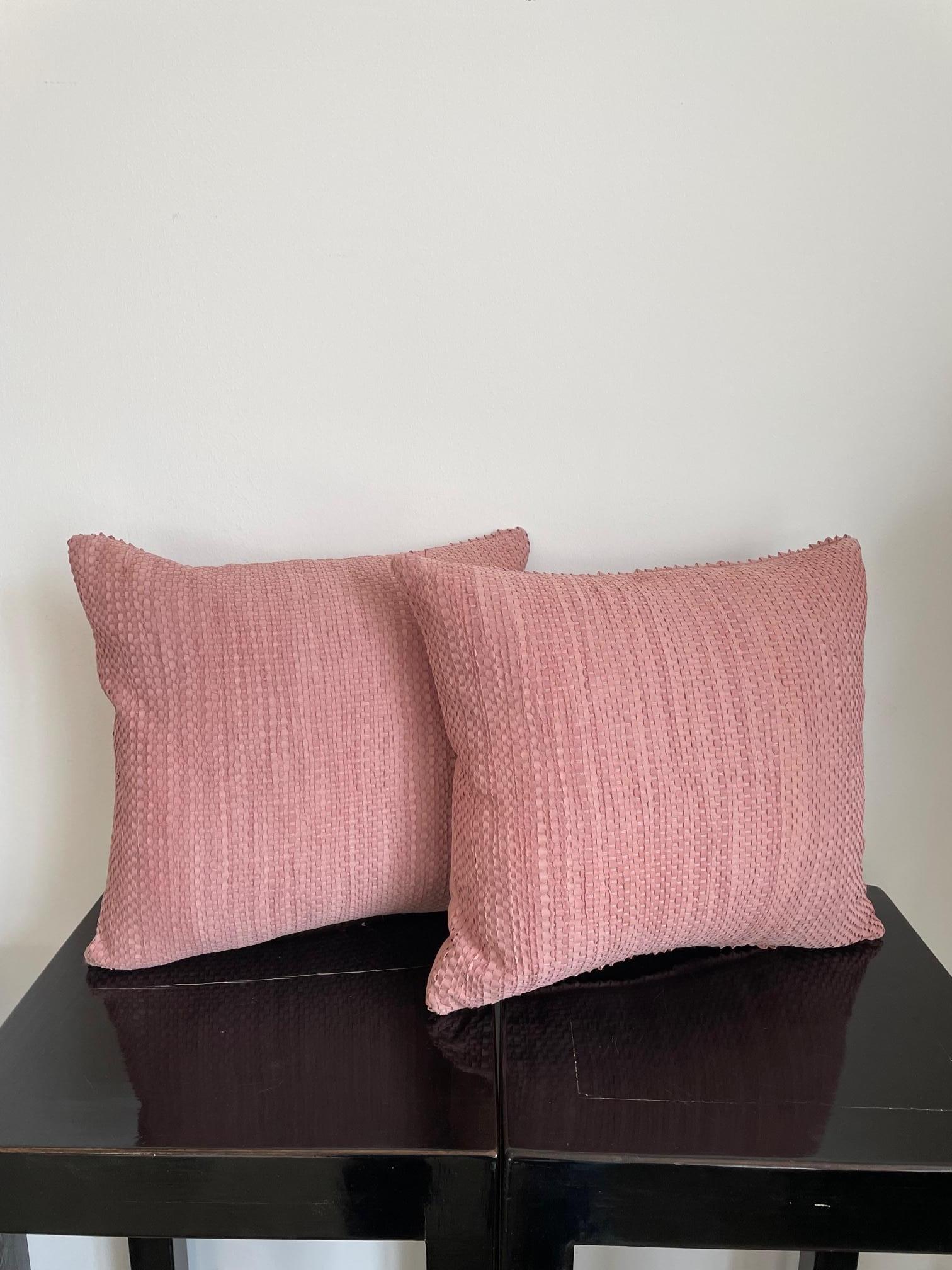 The hand woven Suede cushions colour Pale Pink  have a very delicate colour - the suede from Italy had been hand dyed to our specification.  - see image no. 6 for colour reference .
The panel at the back of the cushions back side with done as well