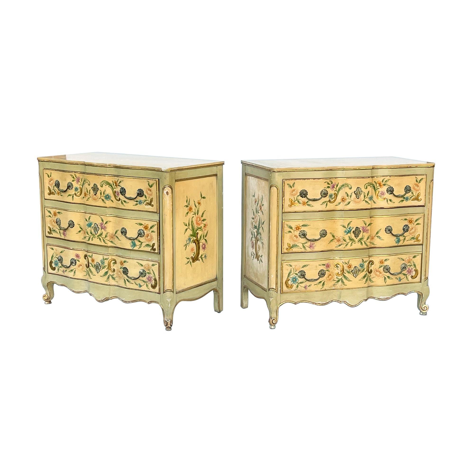 USA, 1960s
Pair of handpainted three drawer chest dressers or large nightstands designed by Ralph Widdicomb for John Widdicomb Furniture Company. Gold leaf detailing along with beautifully handpainted florals across this French Provincial style