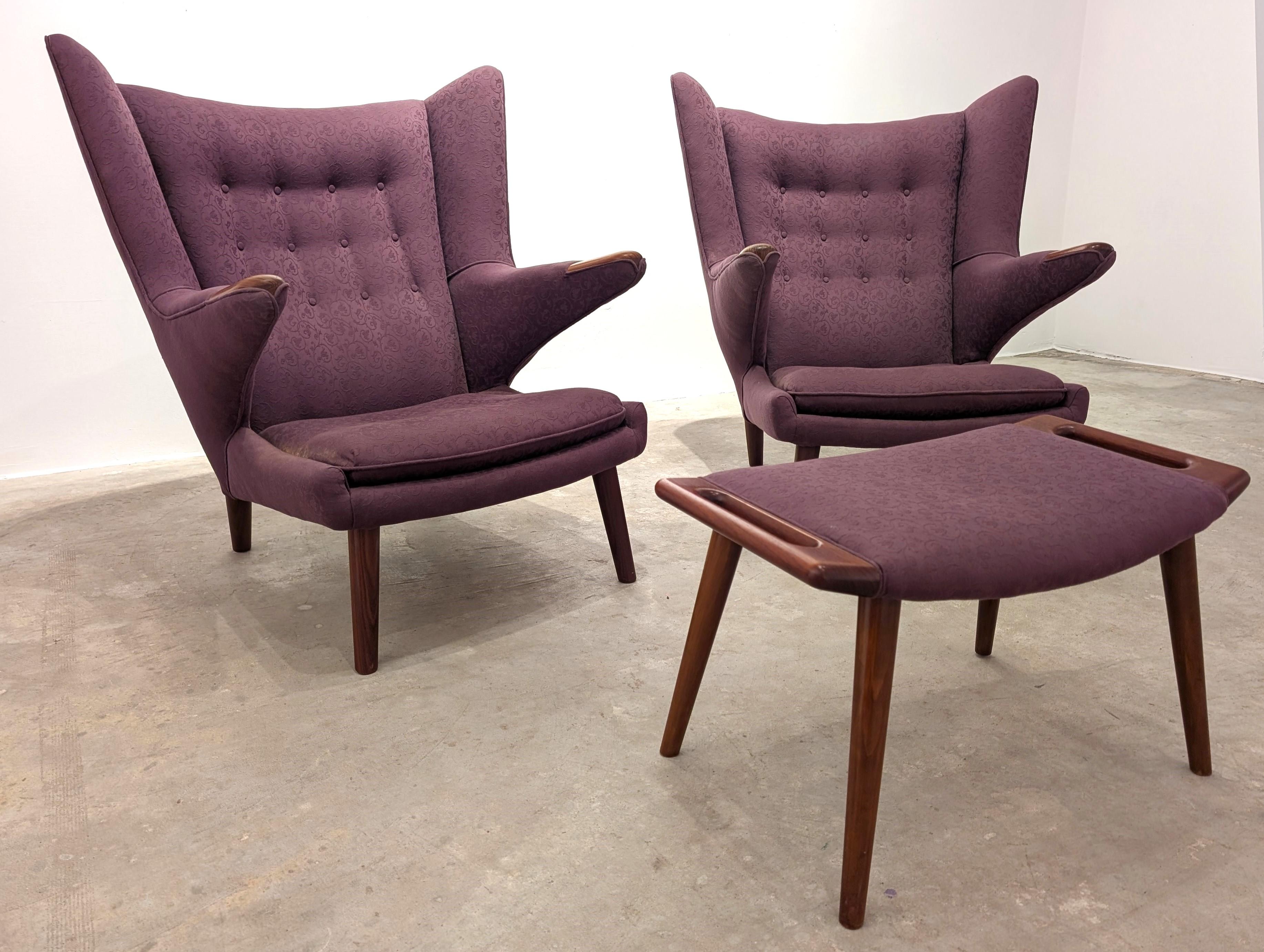 Great Pair of 1960s Hans Wegner Papa Chairs. They include one ottoman and appear to have been re-upholstered in the 1980s. The Fabric is good shape and can be used just fine. They were flown to the United States post War on a B-52 originally