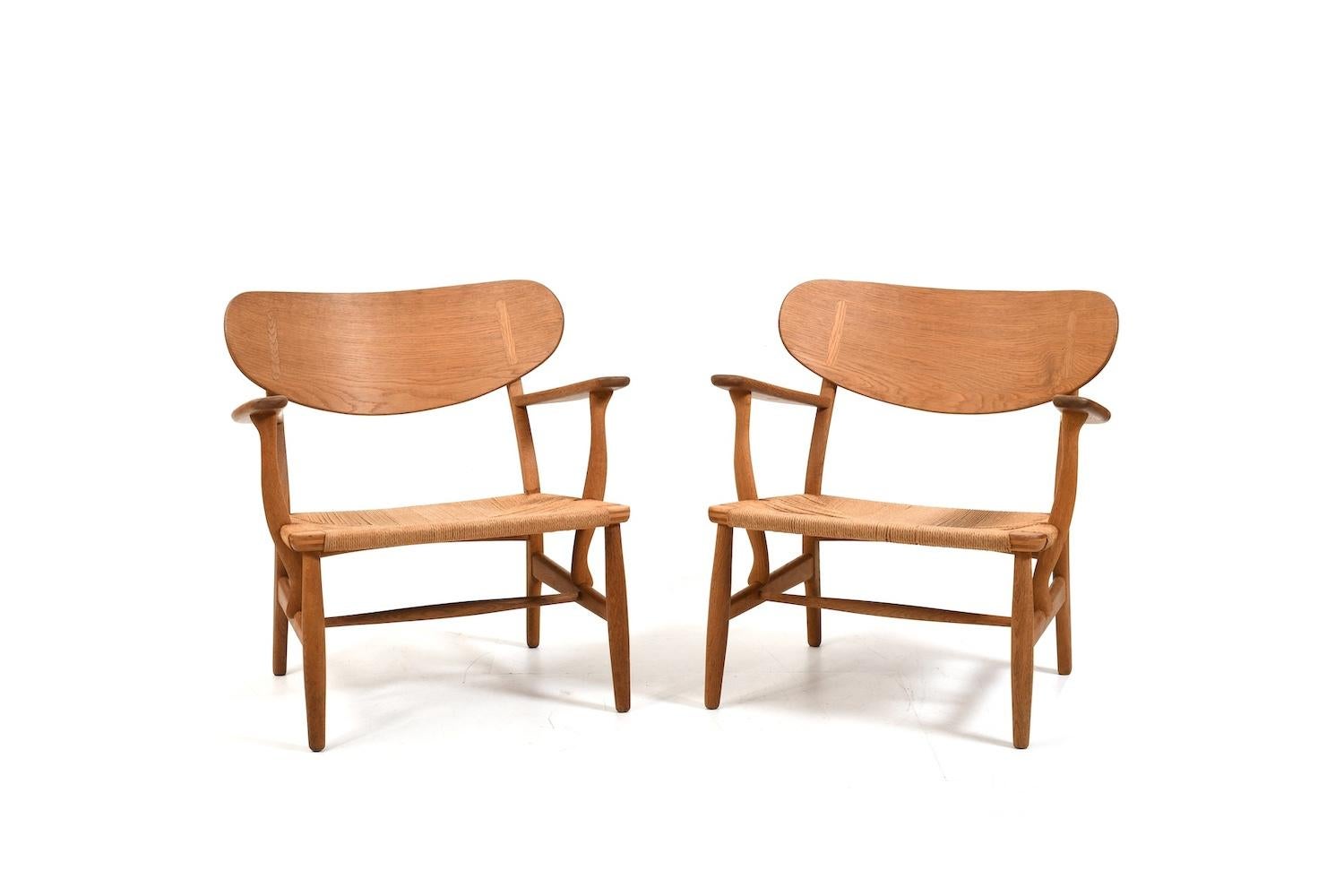 Paar Hans Wegner CH-22 für Carl Hansen & Søn Dänemark 1950er Jahre (Dänisch) im Angebot