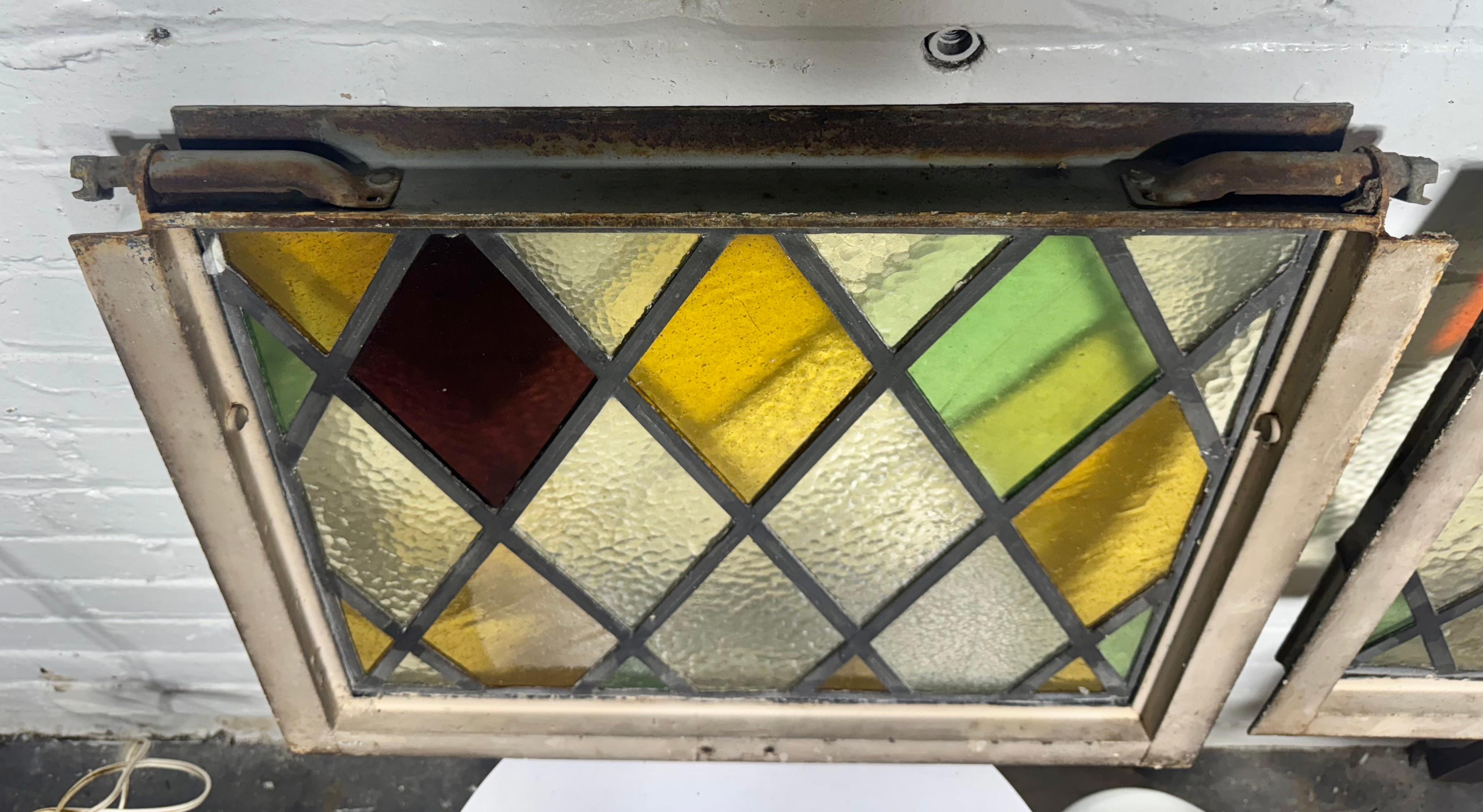 Pair Heavy Cast Iron Frame Tudor Style Diamond Stained Glass Windows In Good Condition For Sale In Buffalo, NY