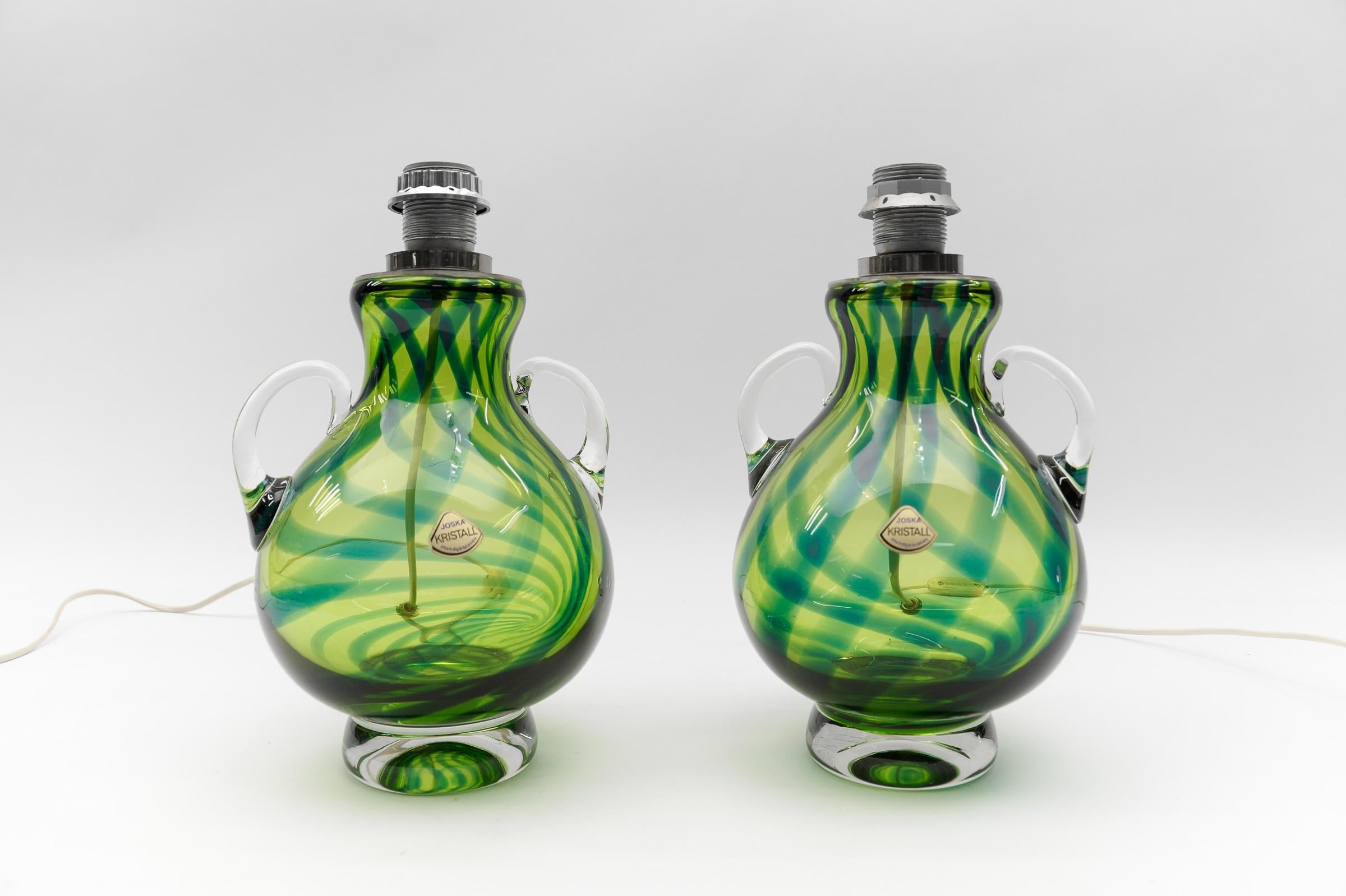 Pair Heavy Mid-Century Modern Handblown Glass Table Lamp by Joska, 1970s Germany

Dimensions
Diameter: 7.48 in. (19 cm)
Height: 13.38 in. (34 cm)

The lamps need 1 x E27 / E26 Edison screw fit bulb, is wired, in working condition and runs both on