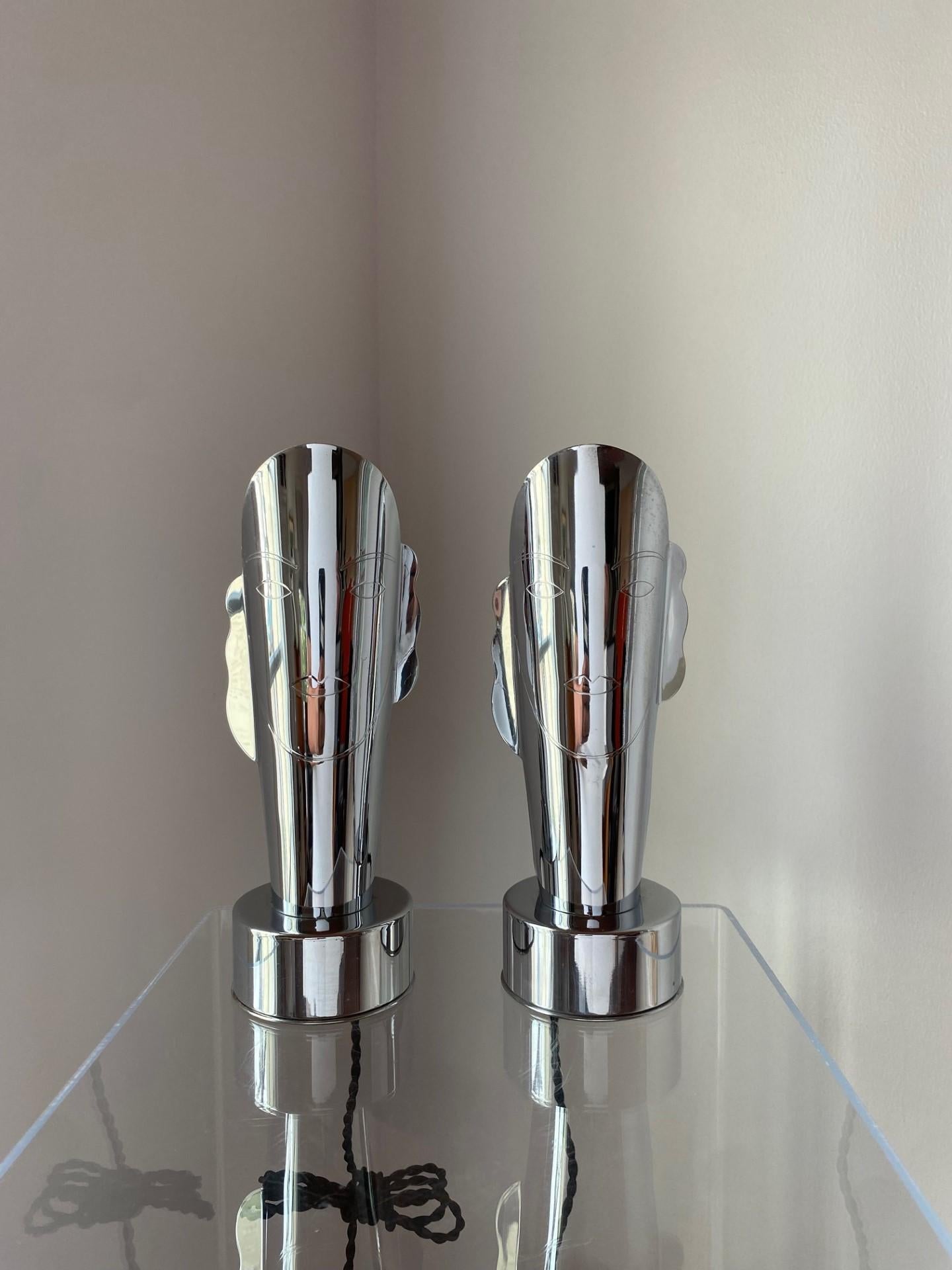 This pair of American Art Deco figural chrome plated 