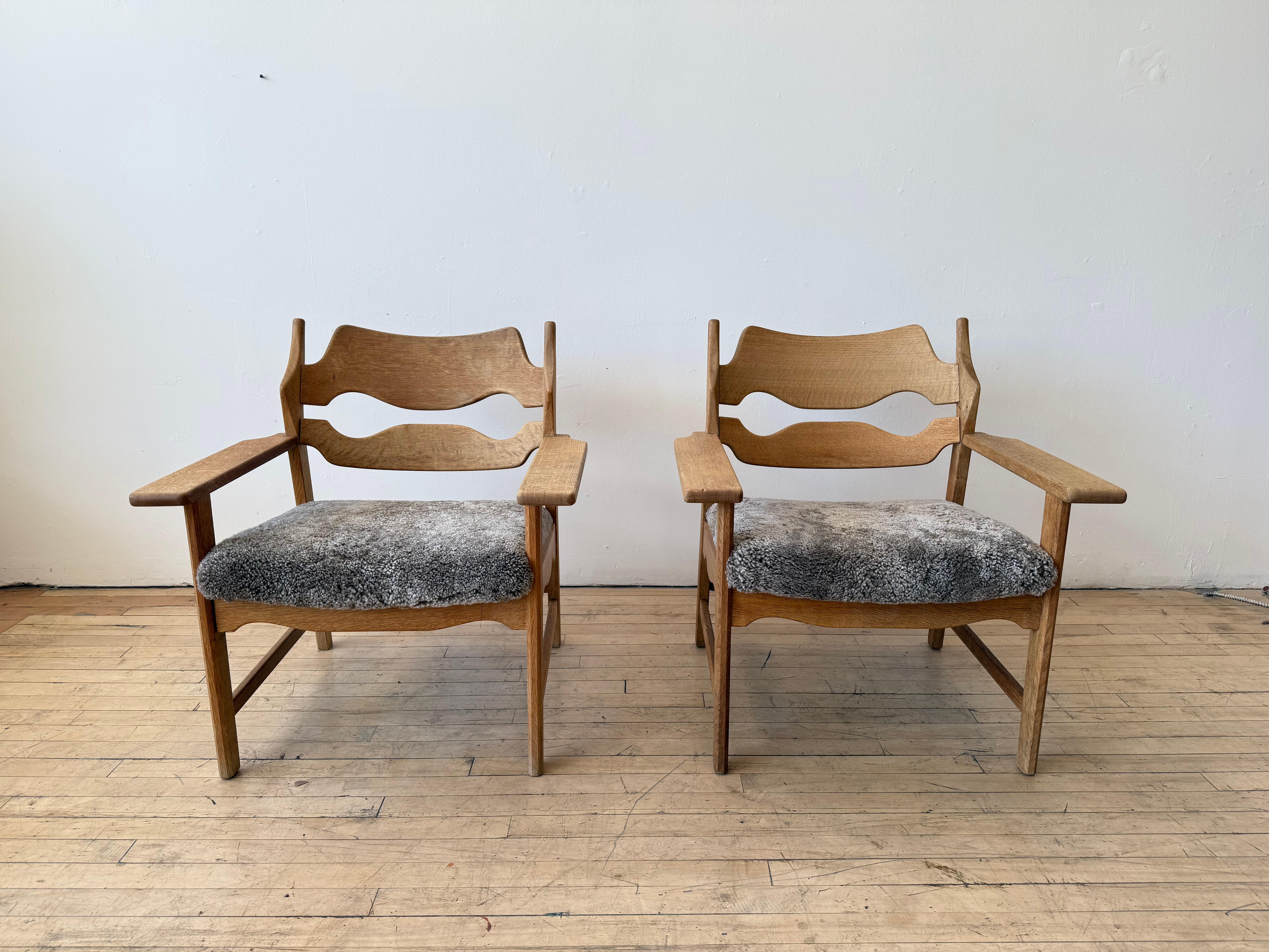 Danish Pair Henning Kjaernulf lounge chairs For Sale