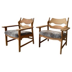 Pair Henning Kjaernulf lounge chairs