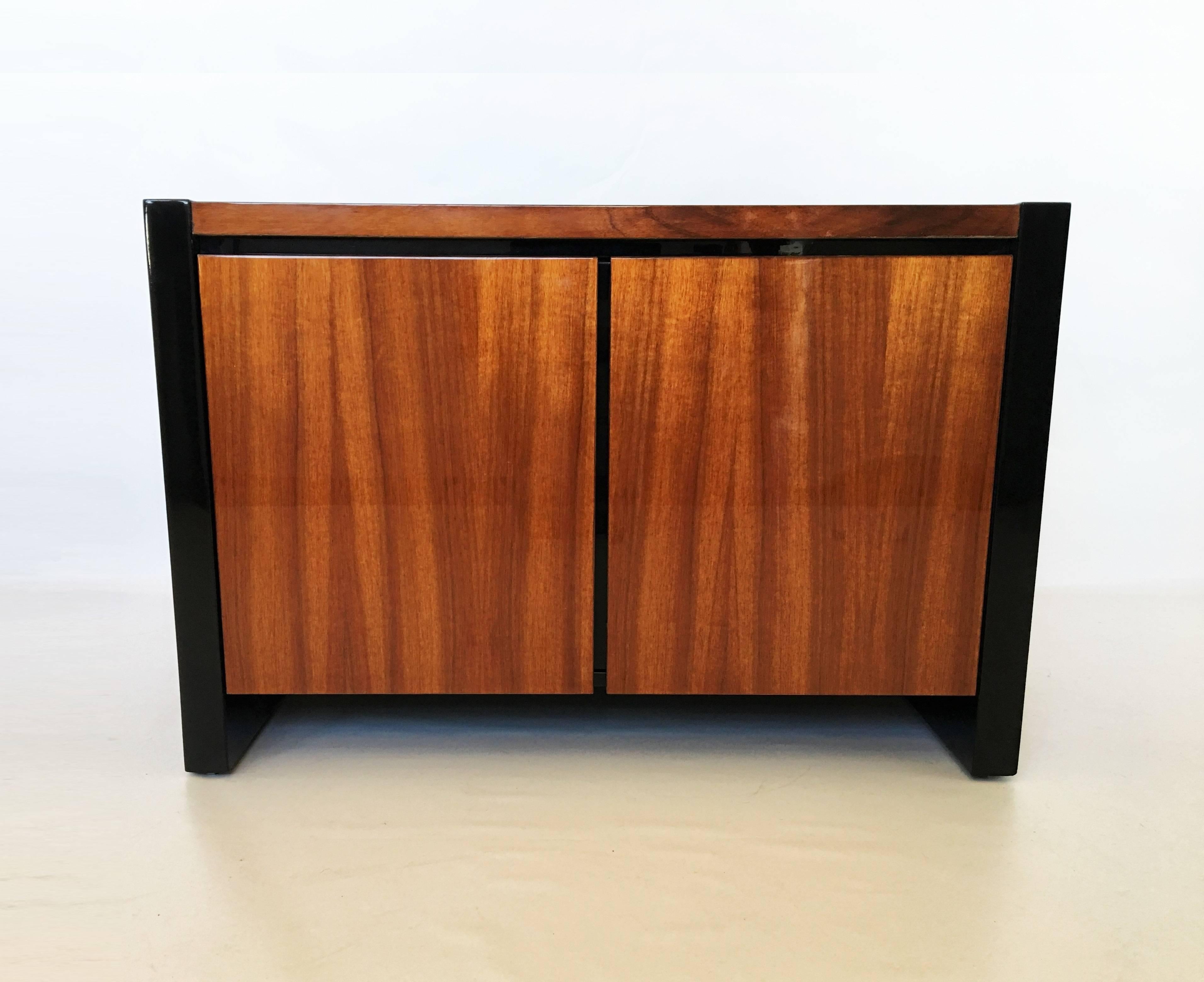Stunning pair of Henredon Koa wood and black lacquer nightstands or side tables from the Elan Collection by Henredon. Featuring Hawaiian koa wood with black lacquer trim. Beautiful grain of the koa wood contrasted against the black lacquer. Each