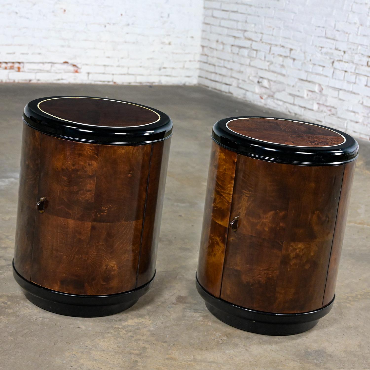 Marvelous pair vintage Modern and a bit Art Deco Revival black lacquer & burl inlay cylinder shaped end table cabinets or nightstands by Henredon. Beautiful condition, keeping in mind that these are vintage and not new so will have signs of use and