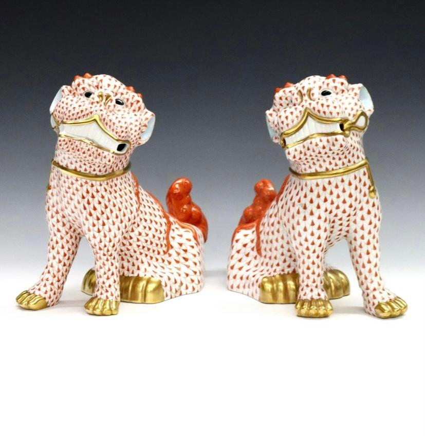 Artist signed and dated limited edition crafted by the world re known factory of Herend, this classic pair of Foo Dogs is in their largest size. Completely hand painted and signed you will find the attention to detail is superb. From the modeling,