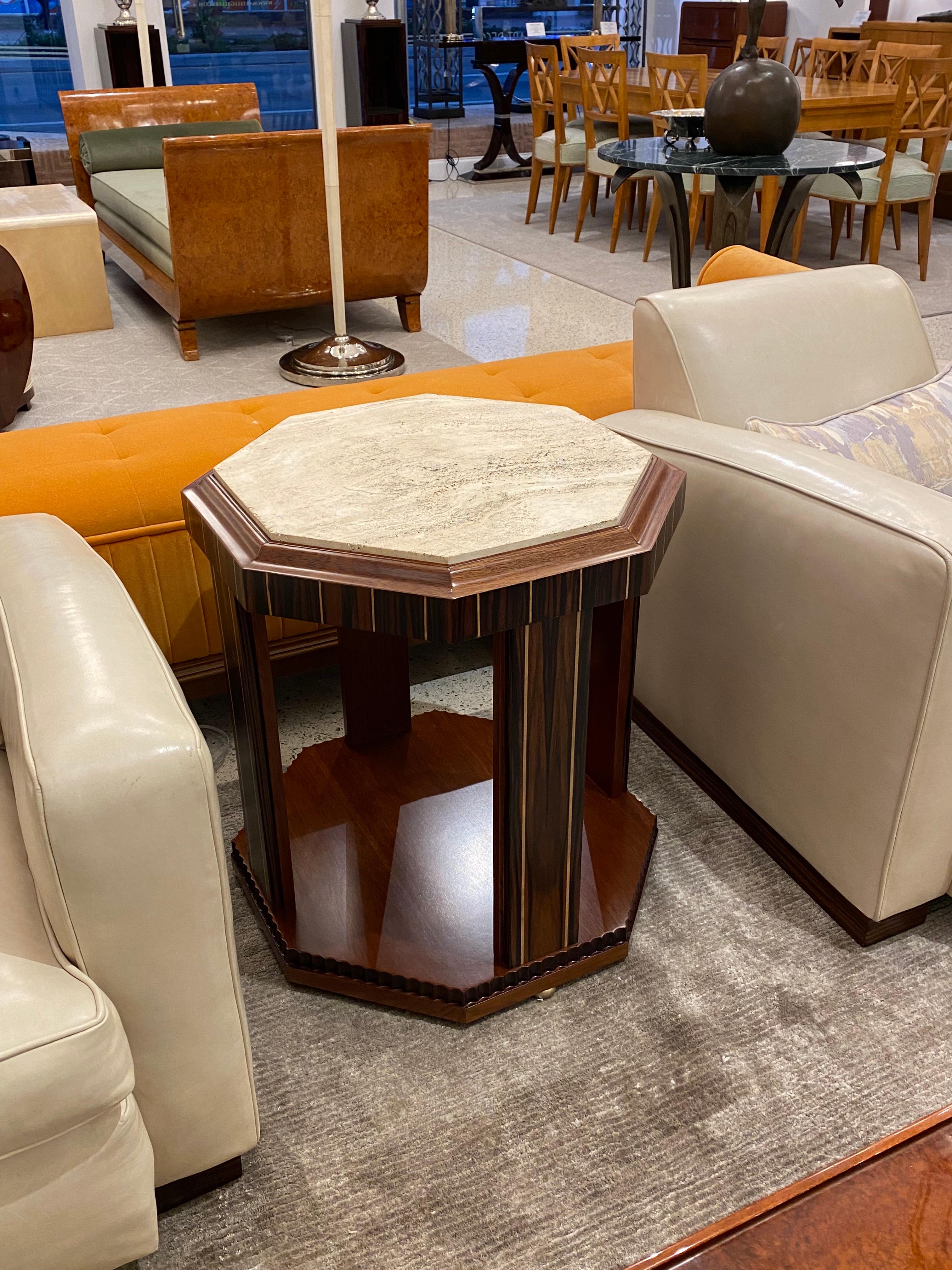 A Magnificent pair of French Mid-Century side tables in Hexagonal shape in Makassar Ebony Wood with inlay details and Travertine top.
Made in France.