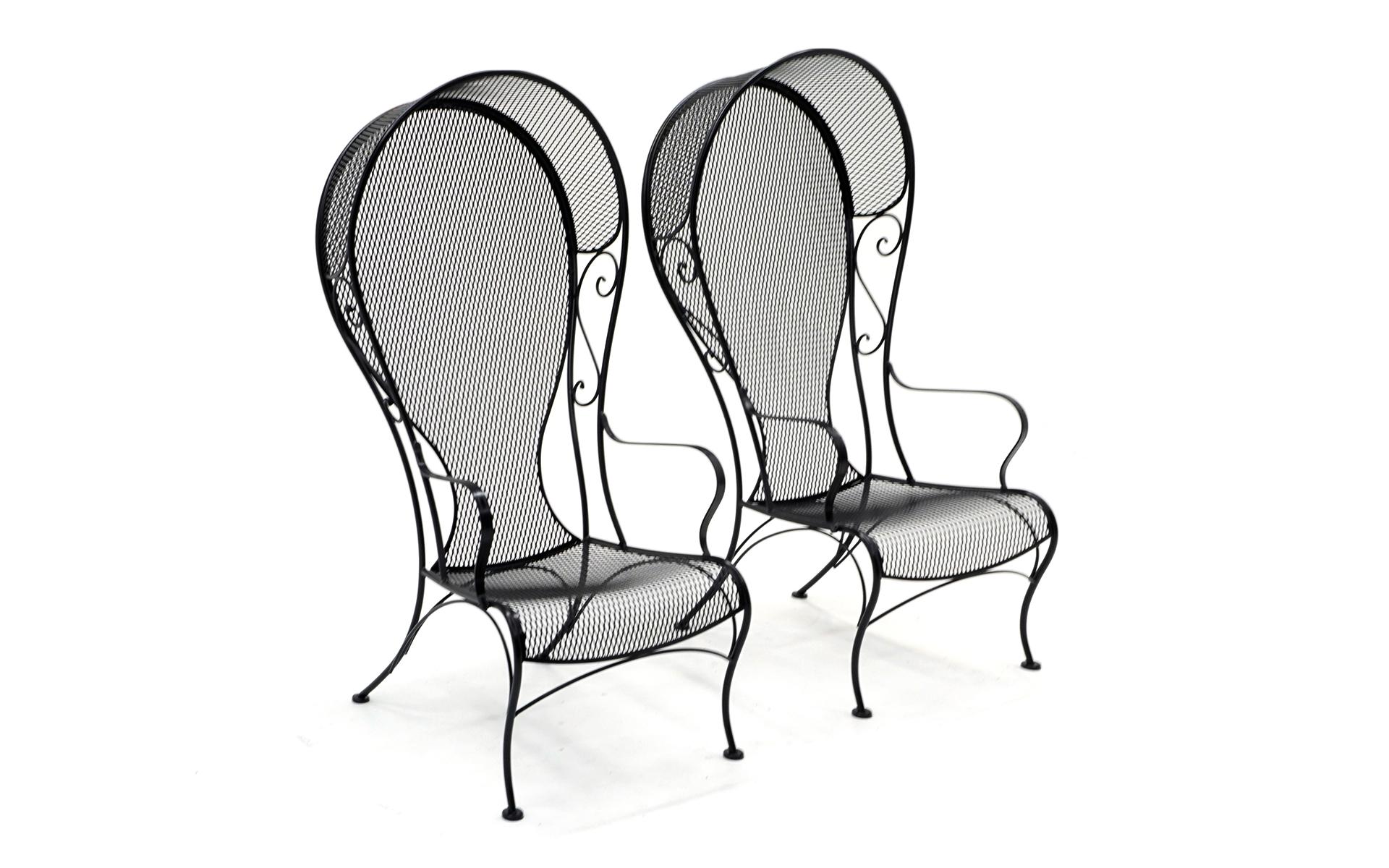 A pair of Russel Woodard designed high back patio chairs in a satin black finish. These have been completely restored and professionally powder coated. Ready to use. 50 years old, but look like new.
