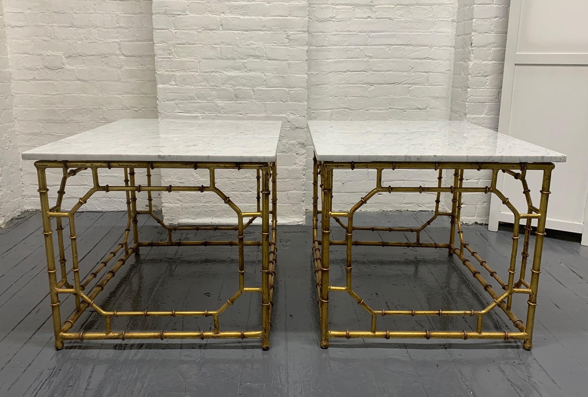 Pair of gilt metal faux bamboo Hollywood Regency end tables with Carrara marble tops.
