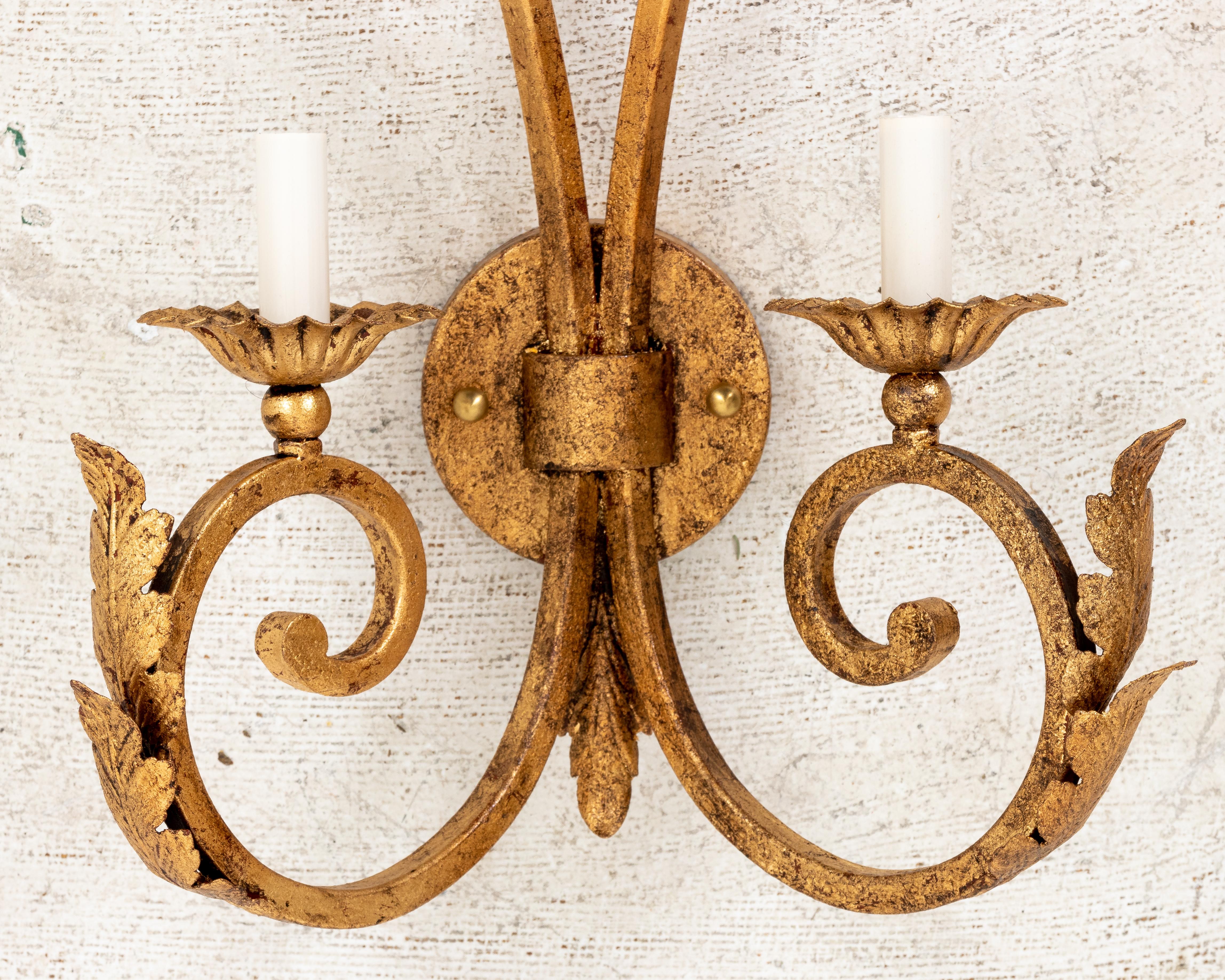 American Pair of Hollywood Regency Gilded Iron Sconces For Sale