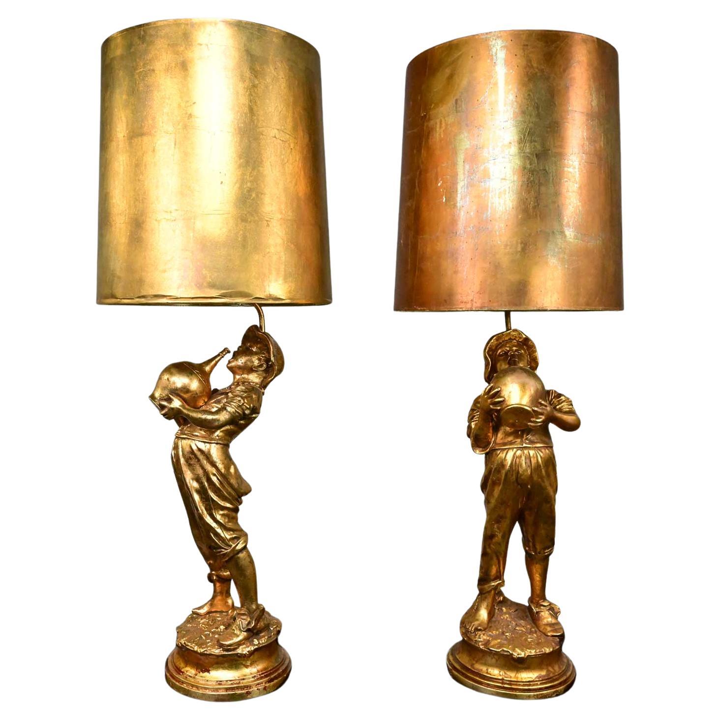 Pair Hollywood Regency Gilded Plaster Large Figural Lamps Boy w Jug Style Marbro For Sale