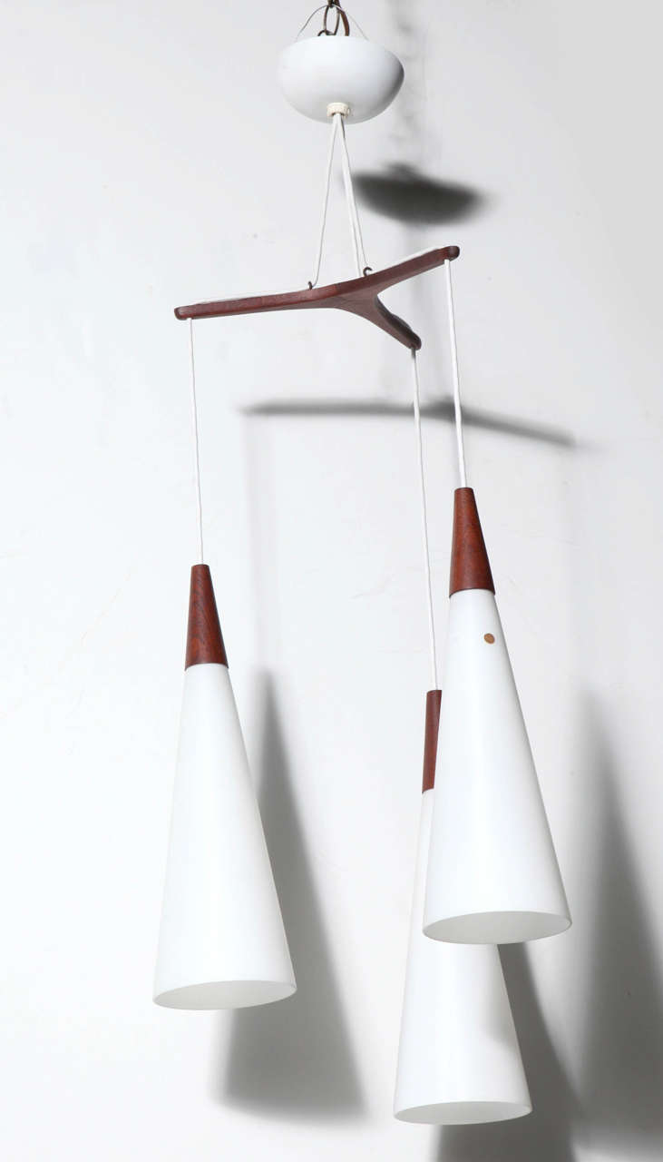 Mid-20th Century Pair Holm Sorensen Kastrup Triple White Glass & Teak Tri-Star Hanging Pendants For Sale