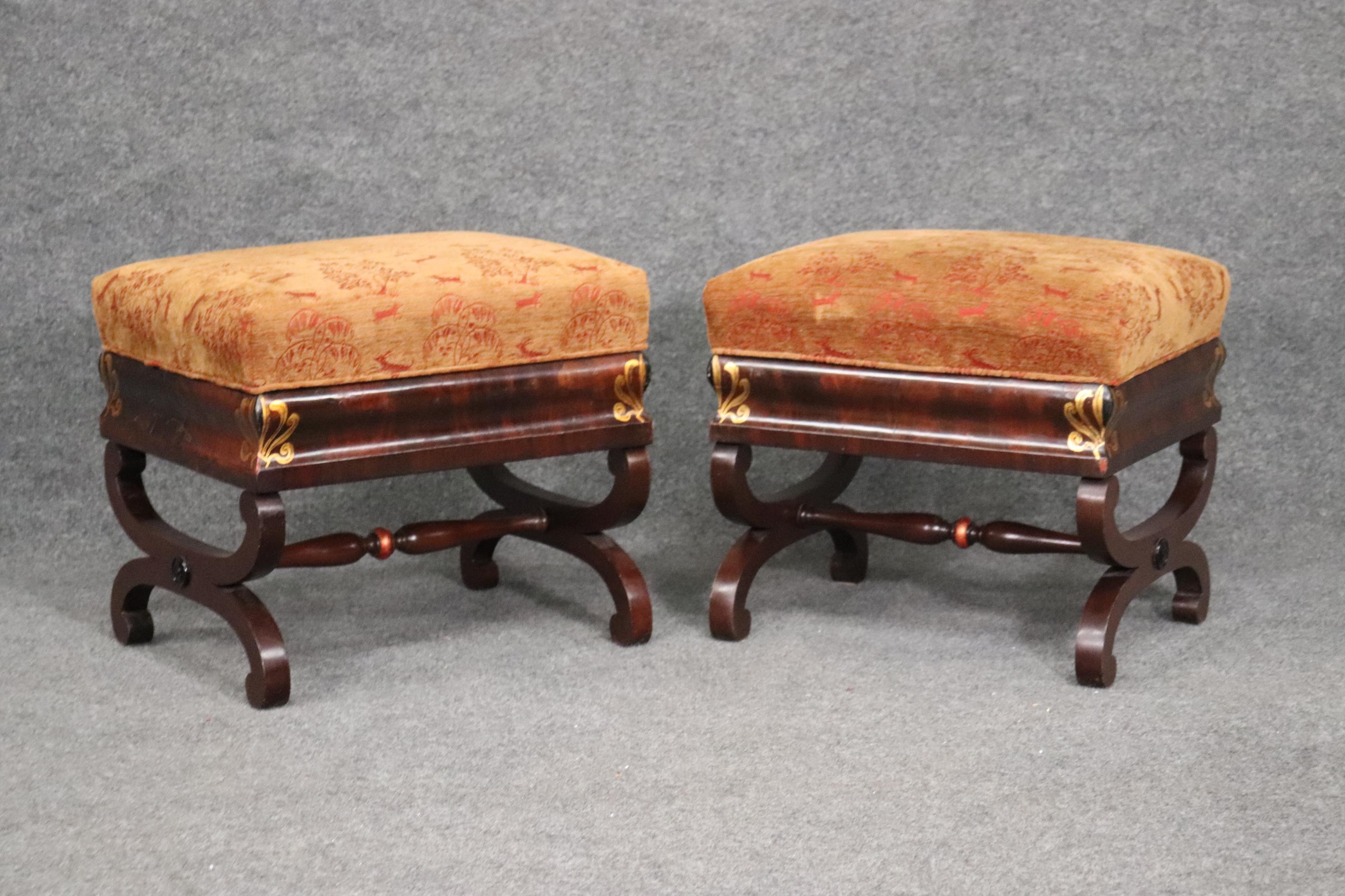 This is a beautiful pair of empire stools with gilded anthemia. They each are in good condition and measure 16 dep x 20 wide x 18 inches tall, They date to teh 1840s era.