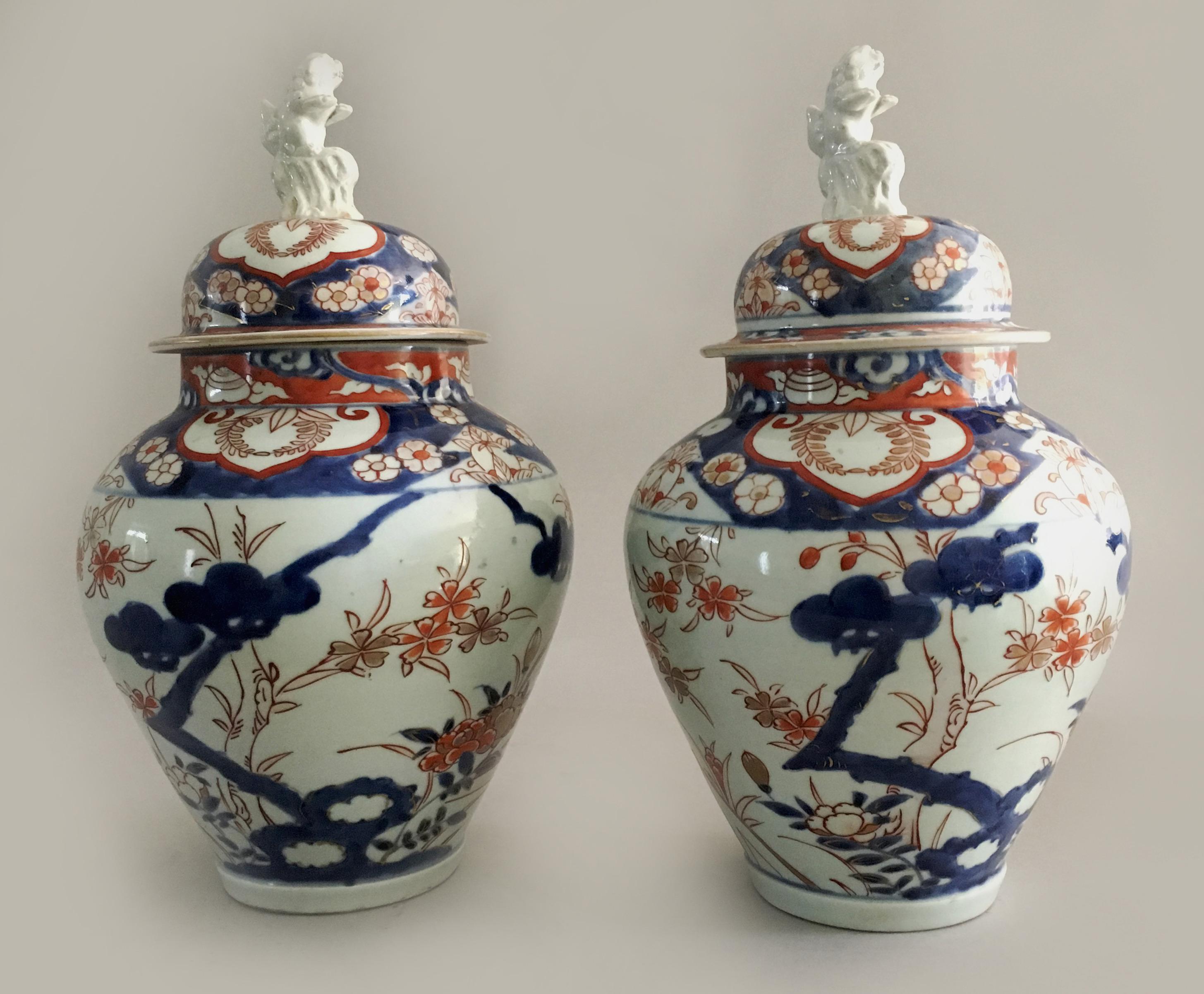 Edo Pair of Imari Vases with Lids and Foo Dog Finials For Sale