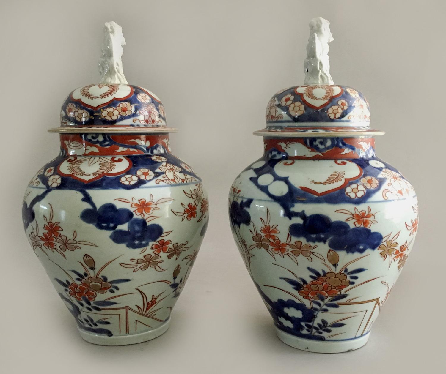Japanese Pair of Imari Vases with Lids and Foo Dog Finials For Sale