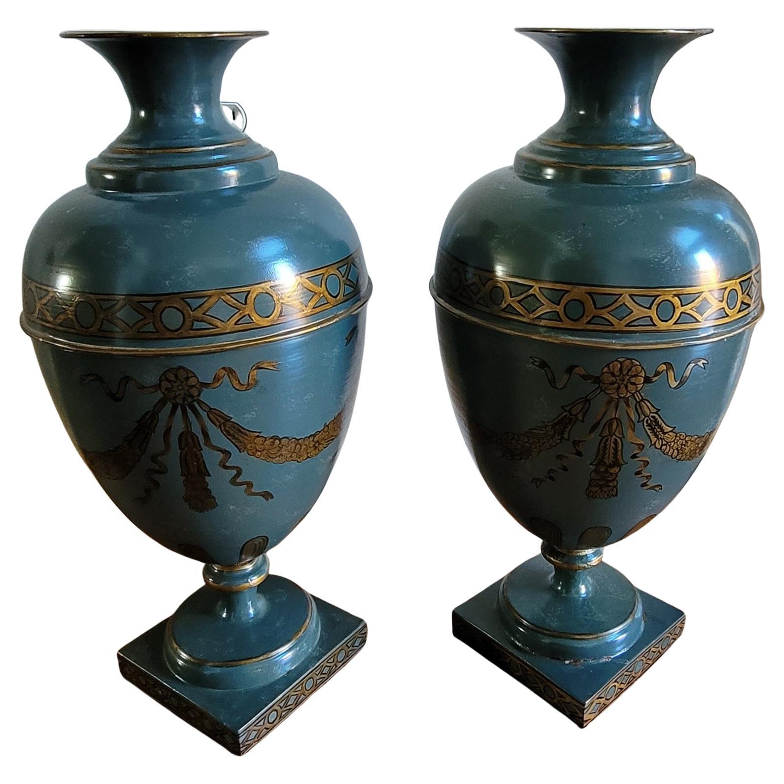 A charming pair of hand-painted metal vases by Interior Concepts. Felt lined bottom. 
Measure 9