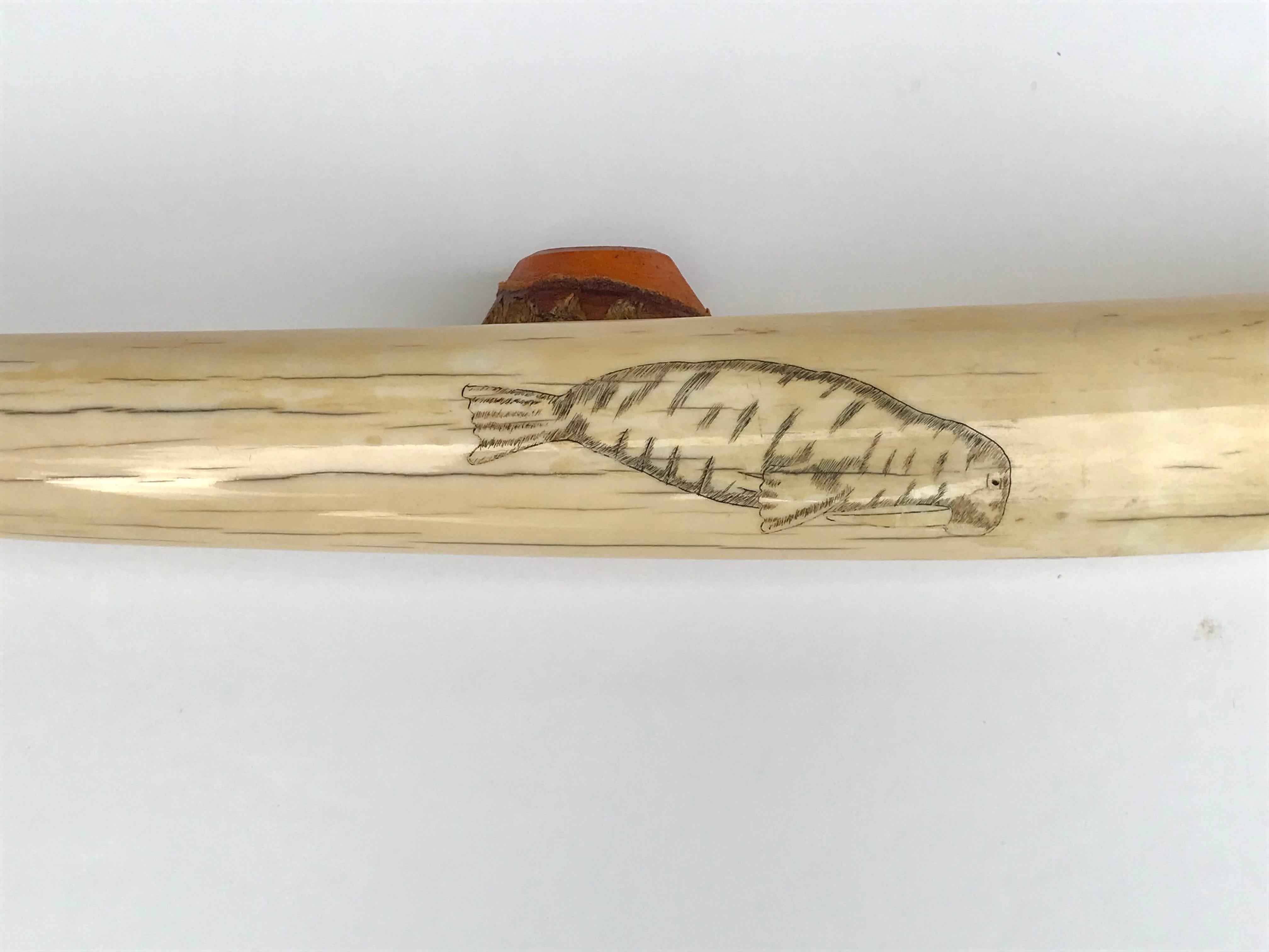 Hand-Carved Pair Inuit Seal and Whale Scrimshaw Walrus Ivory Tusks For Sale