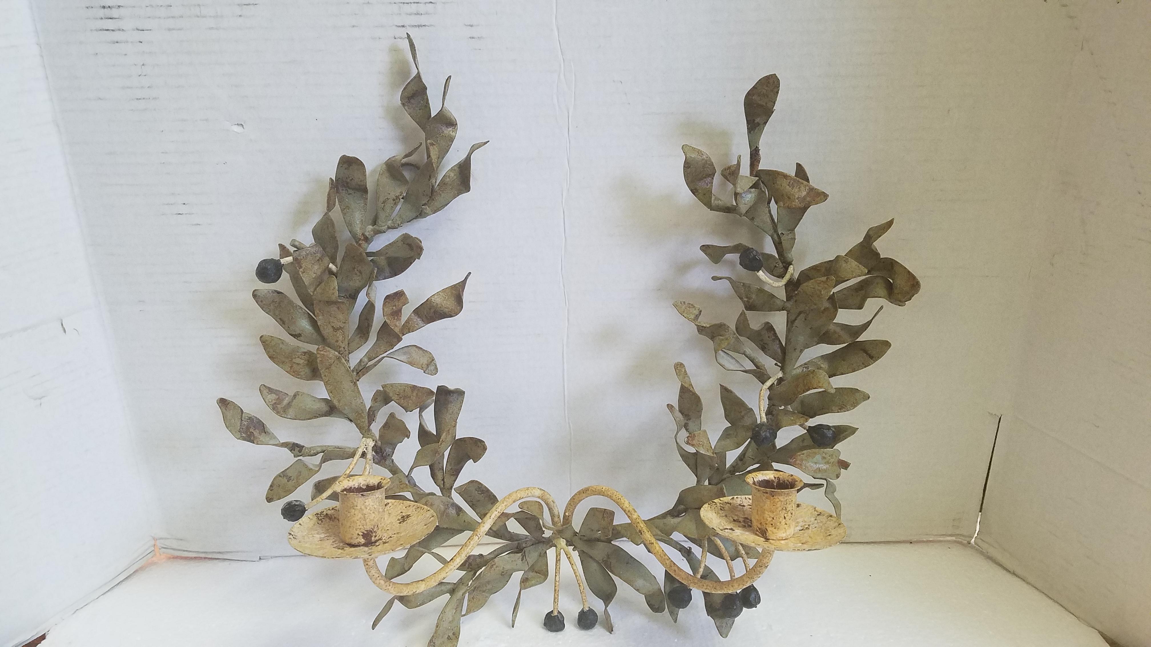 Beautiful pair of handmade iron candle sconces. Distressed painted in a sage green with dark cream candleholder arms and accented with black berries. This unique design of the 3/4 wreath is a Classic with an updated twist. See the detailed photos.