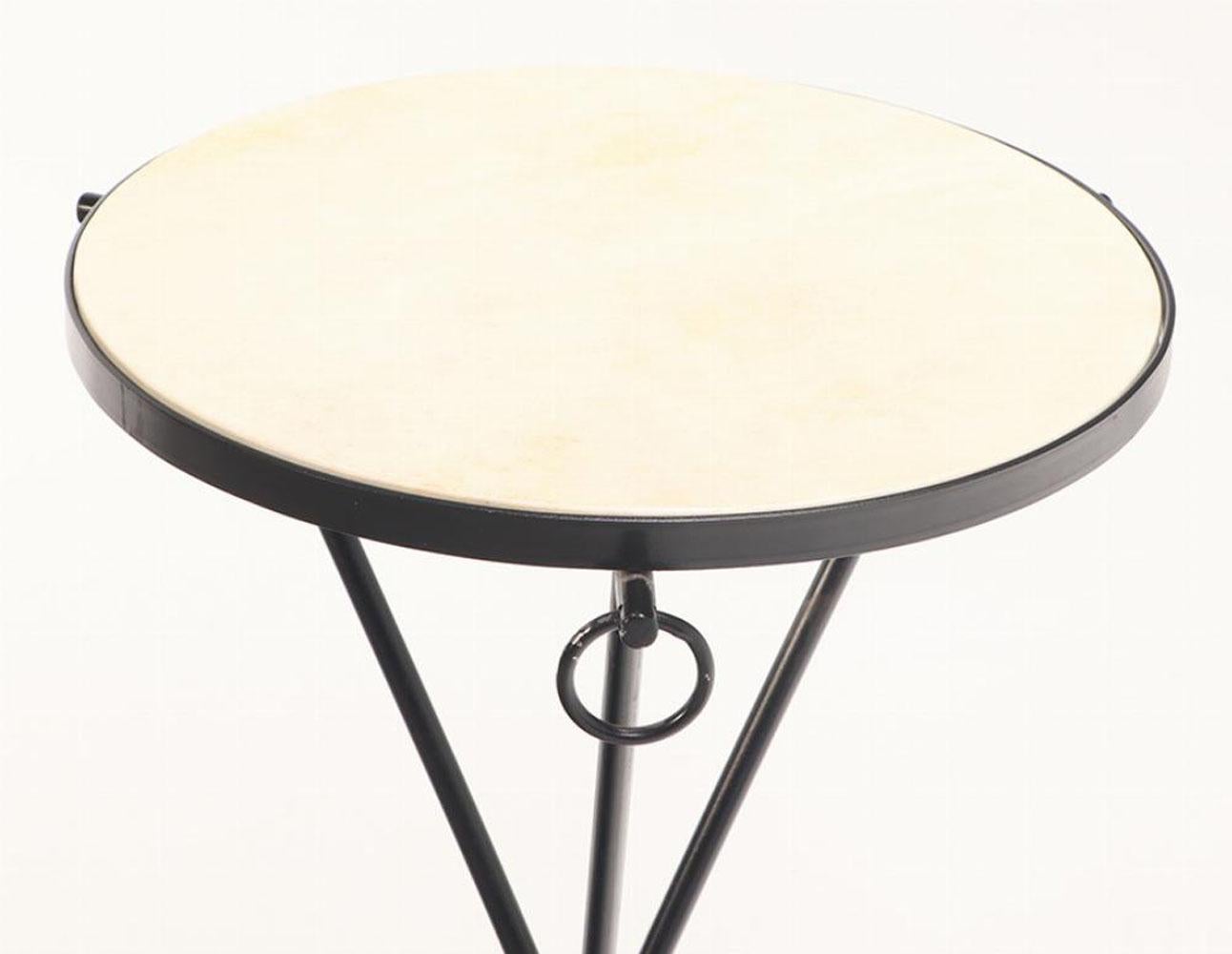 European A Pair of Iron Drinks Tables With Parchment Covered Tops. For Sale