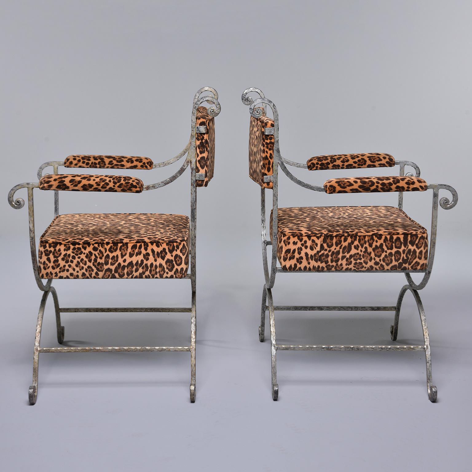Pair of Iron Savonarola chairs with leopard print upholstery

Found in Italy, this pair of circa 1950s Savonarola style armchairs have an iron base with curved feet, padded arms and new leopard print moleskin upholstery.
Measures: Arm height